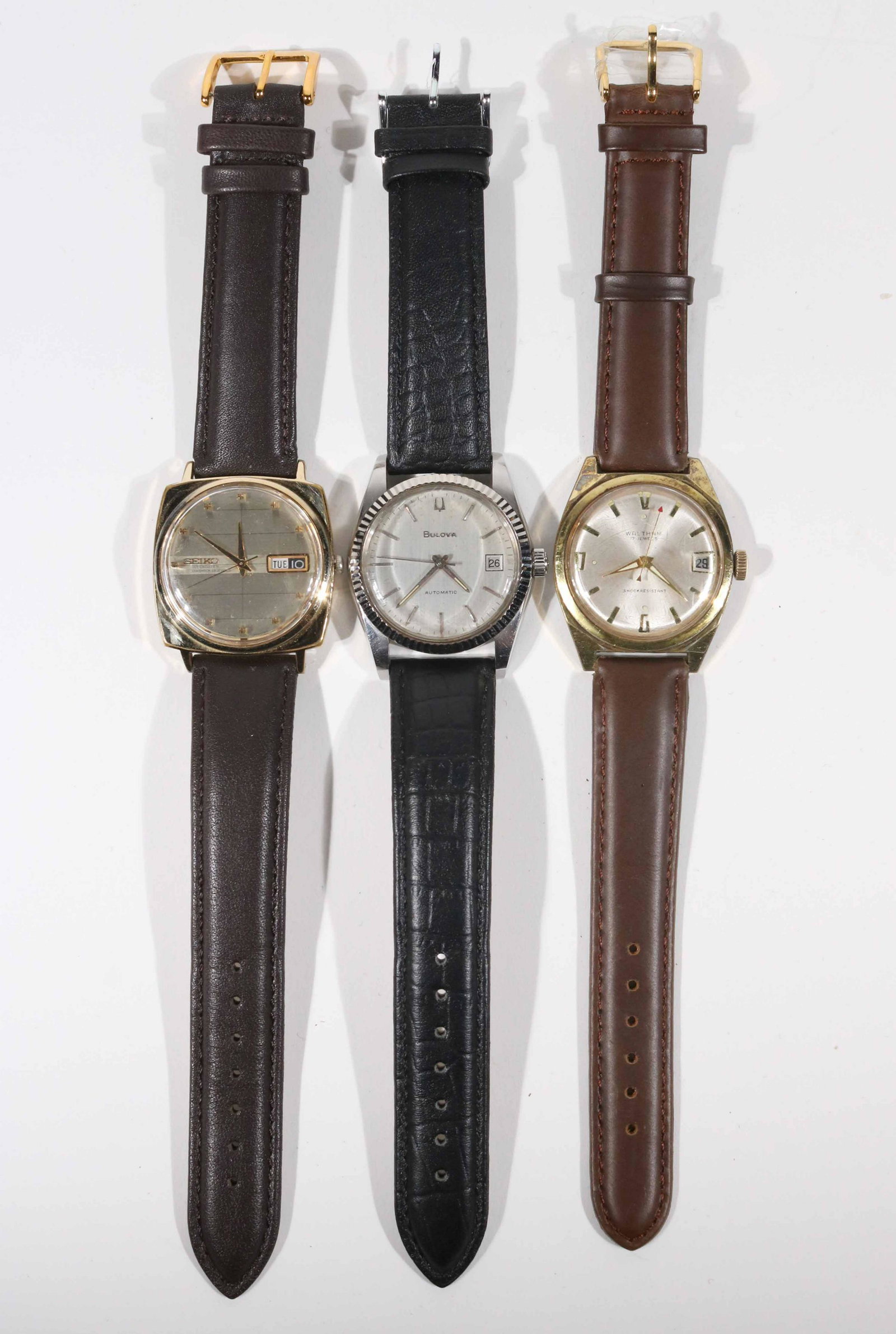 Lot of 3 Vintage Watches Bulova, Seiko, Waltham: Vintage Bulova Automatic Stainless Steel Watch with date indicator and coin edge bezel, wear/worn with scratches but in overall Good condition, automatic movement, 23J, approx. 36mm case, size, 20mm l