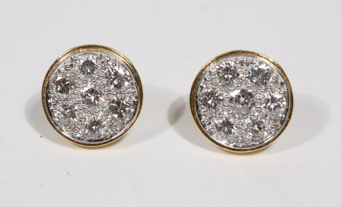 Pair of David Webb Diamond Disc Earrings: A PAIR OF DAVID WEBB DIAMOND DISC EARRINGS each set with 7 diamonds in platinum with yellow gold frames METAL: 18 Karat gold and Platinum STONES: 14 diamonds weighing approximately 1.40 carats total (