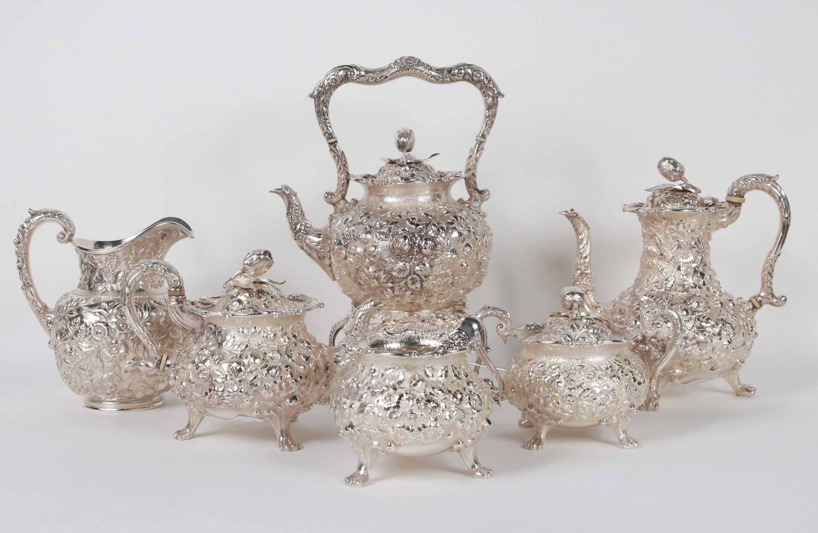 Jenkins and Jenkins Southern Sterling Tea Service: Jenkins and Jenkins of Baltimore. Comprising: hot water kettle on stand, coffeepot, teapot, covered sugar, waste bowl and a sugar tong (perhaps of a later date). A wedding present to the Baltimore soc