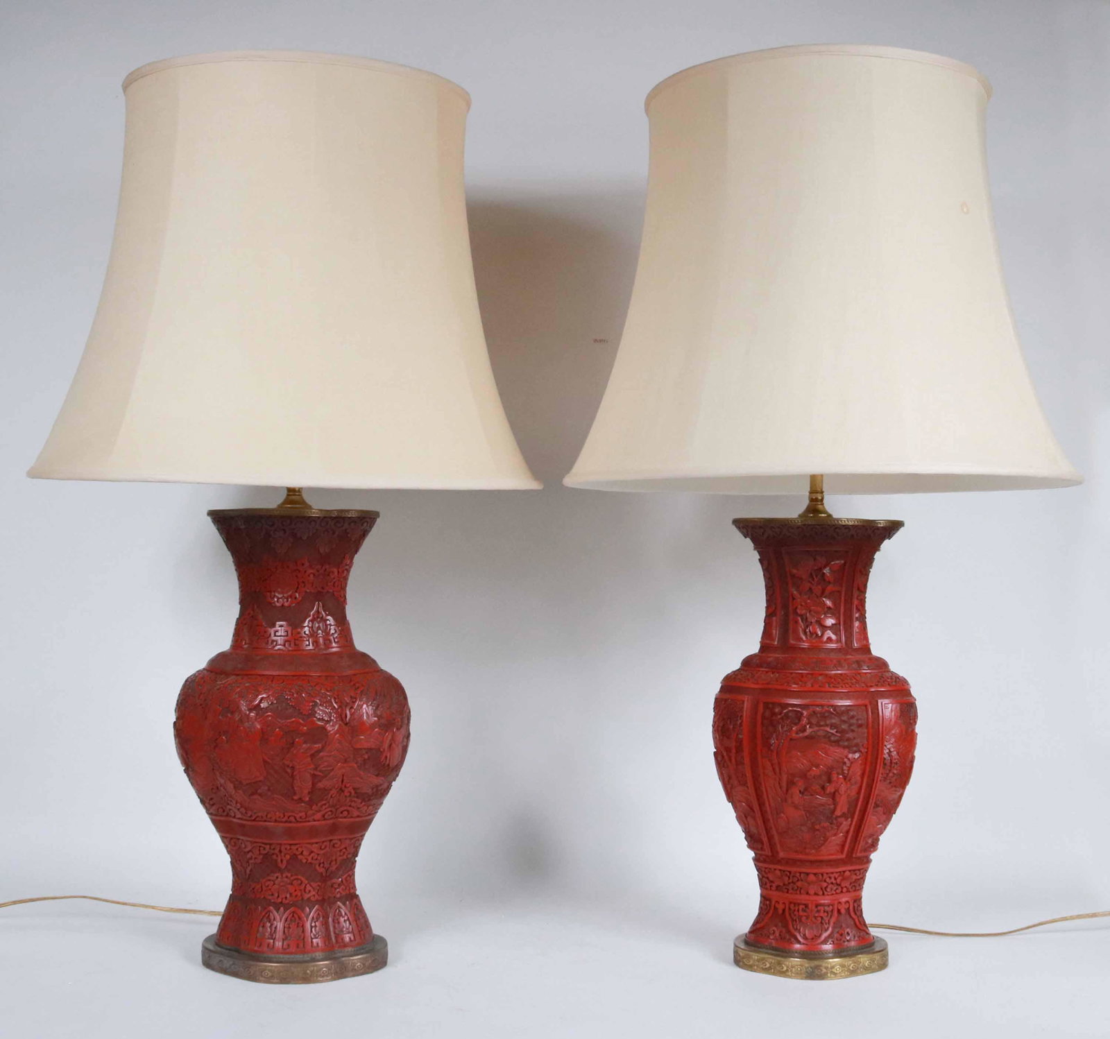 Pair of Chinese Cinnabar Vases: 19th/20th C. electrified and fitted as lamps. Vase: 16-1/2"h x 9"w x 8"d Overall: 34"h Provenance: Property from the Estate of Robert K. Johnson of Maine and South Carolina
