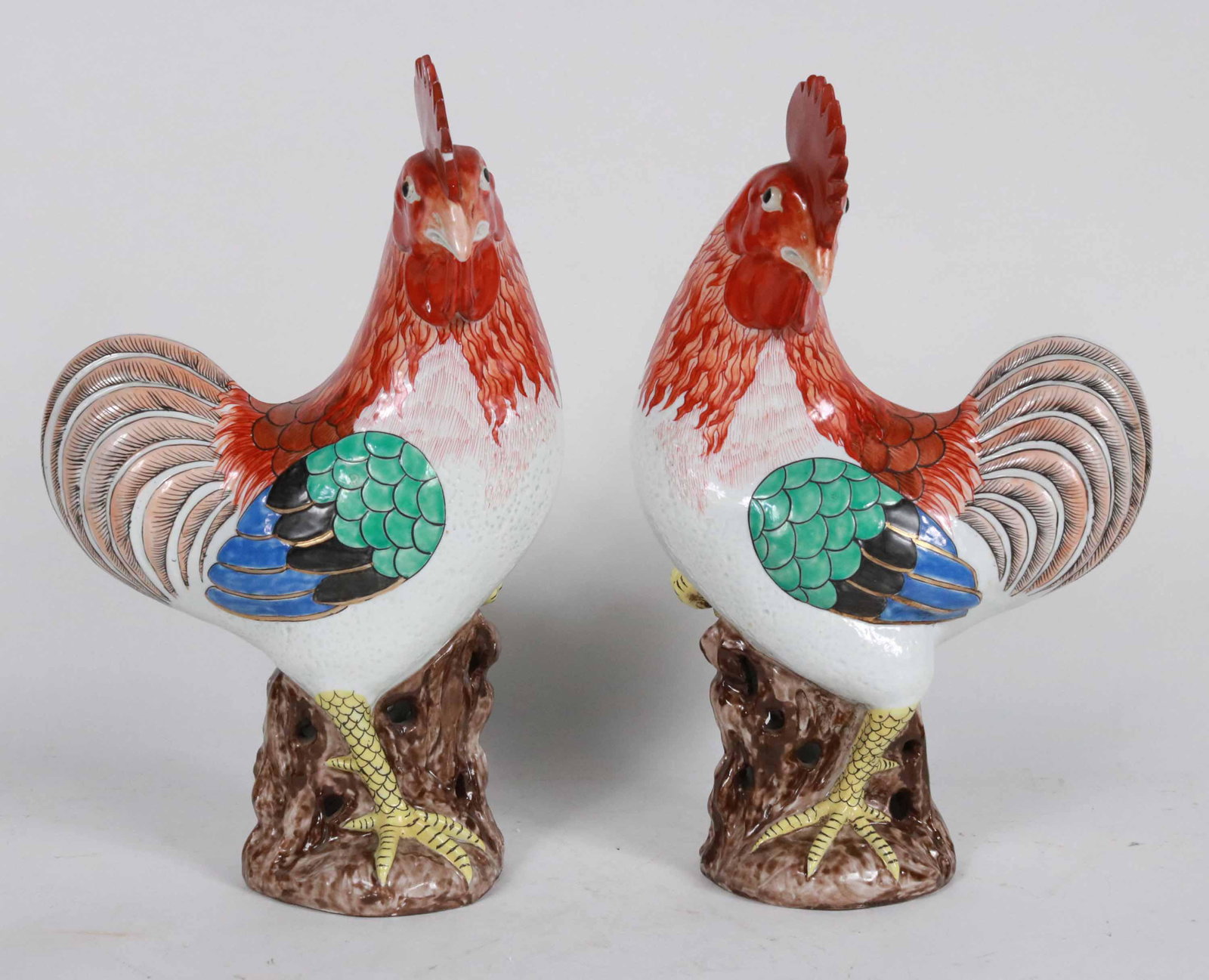 Pair of Chinese Export Porcelain Rooster Figures: 19th C. one marked underside. One with loss to head. 14-1/4"h x 9"w x 4-1/2"d Provenance: Property from the Estate of Robert K. Johnson of Maine and South Carolina