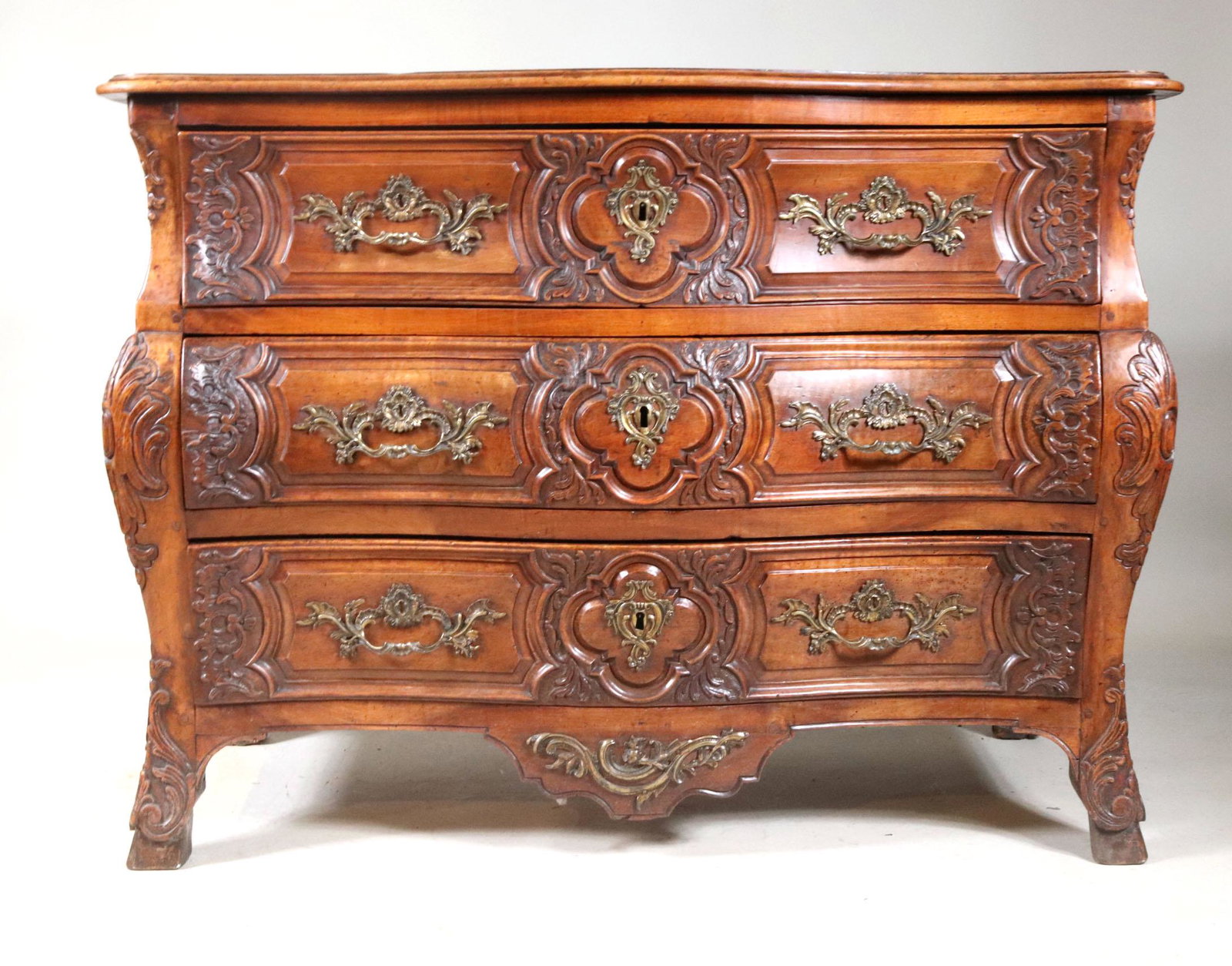 Rococo Carved Walnut Serpentine Front Commode: Continental, 19th C. Losses to rear feet, worm damage. 39-3/4"h x 4'6"w x 28"d