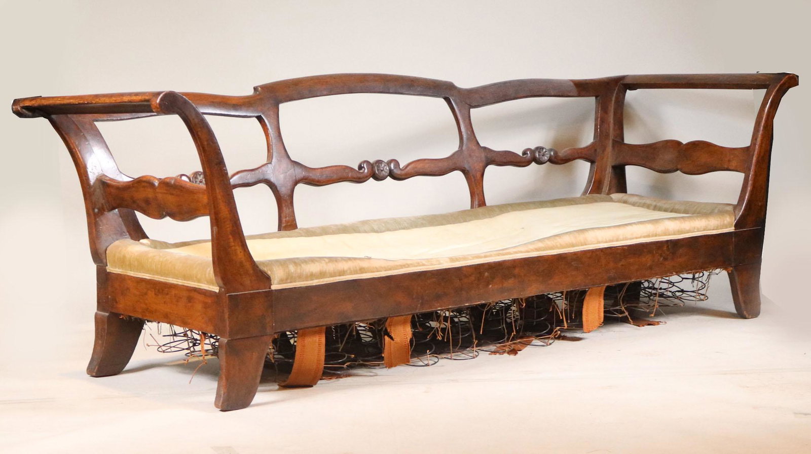 Biedermeier Maple Sofa: Continental, 19th C. 32"h x 6'4-1/2"w x 30-1/2"d Provenance: Property from the Estate of William Hodgins, Boston, Massachusetts