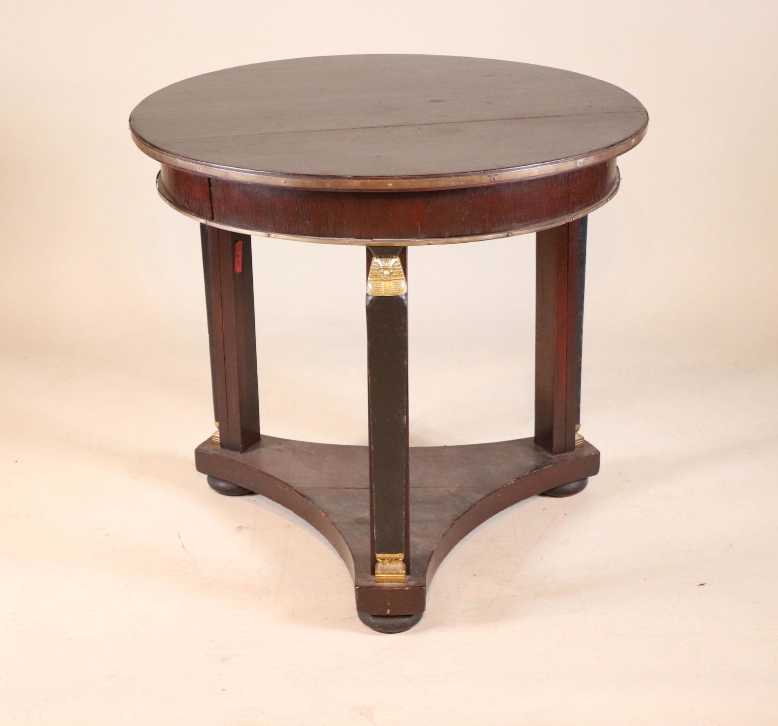 Empire Ormolu-Mounted Side Table: French, 19th/20th C. Losses 29-1/2"h x 32"dia. Provenance: Property from the Estate of William Hodgins, Boston, Massachusetts