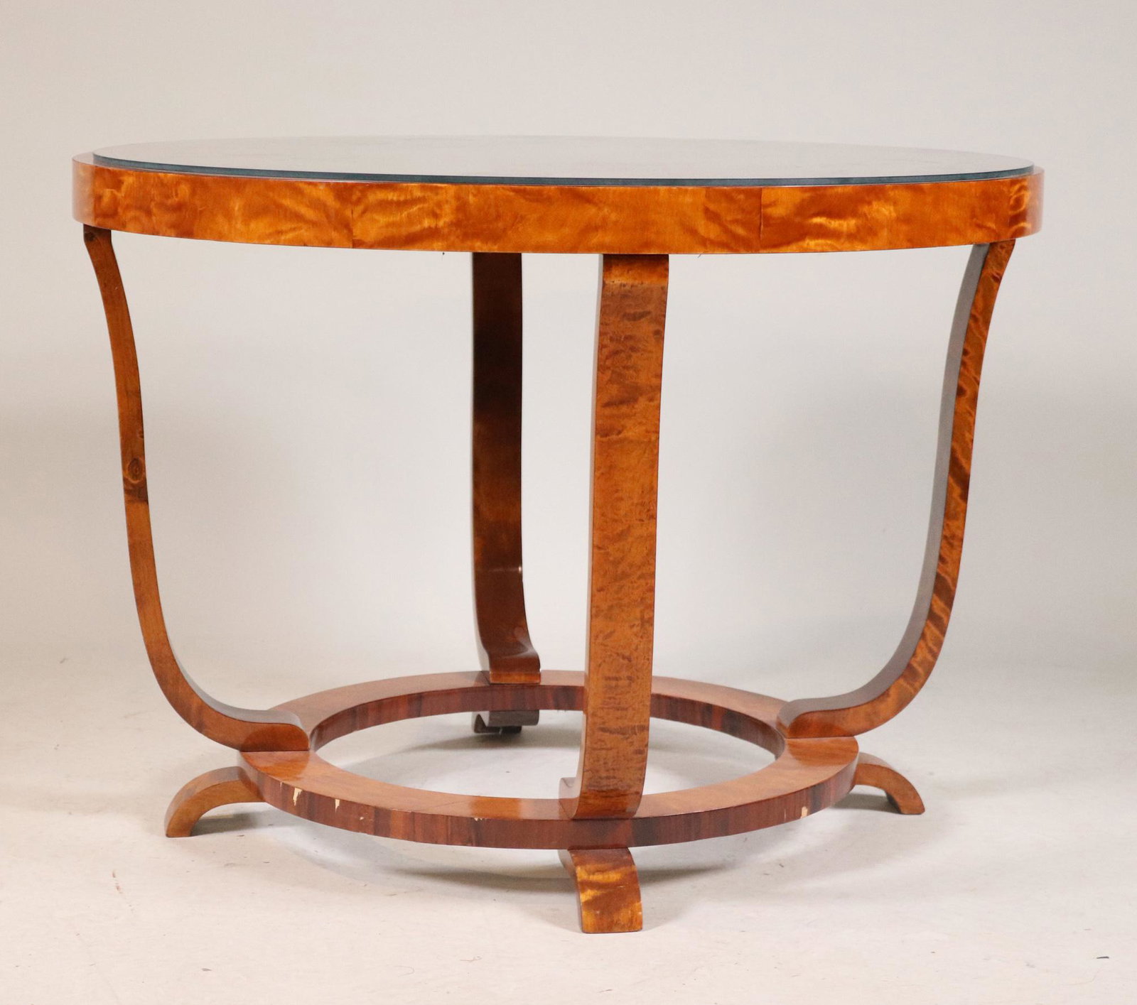 Biedermeier Style Burlwood Round Center Table: 20th C., with circular stretcher. Losses to veneers around base. 25-1/4"h x 35-1/2"dia.