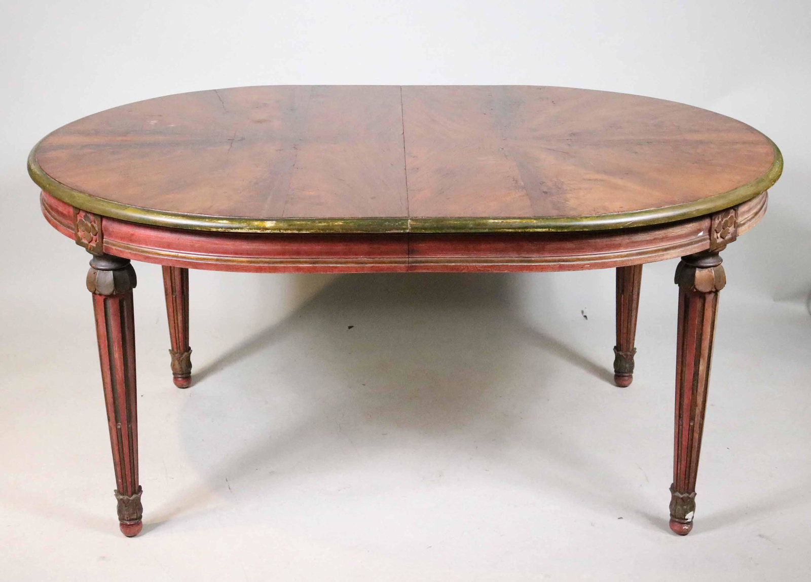 Neoclassical Style Painted Extension Dining Table: 20th C. with painted base and mahogany top. Together with three 21"w leaves. Losses to paint. 30"h x 5'3"w x 46"d