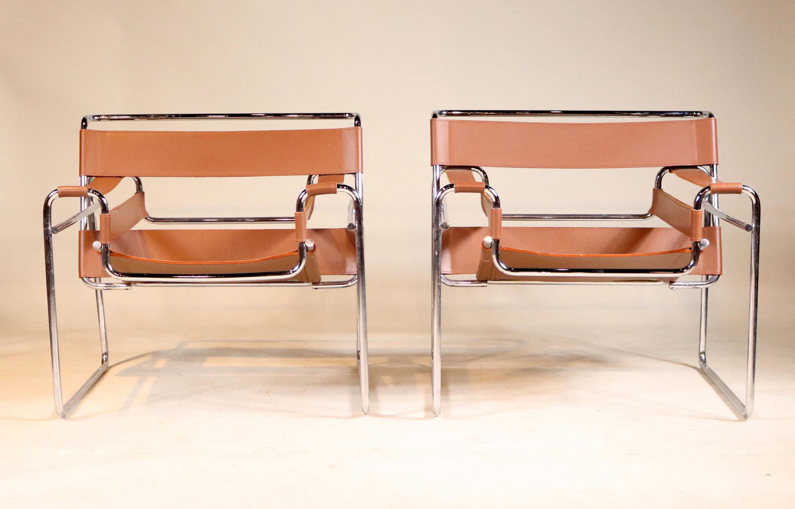Pair of Leather and Chrome Wassily Chairs: 20th C. Marcel Breuer for Knoll. 29"h x 30-1/2"w x 27"d