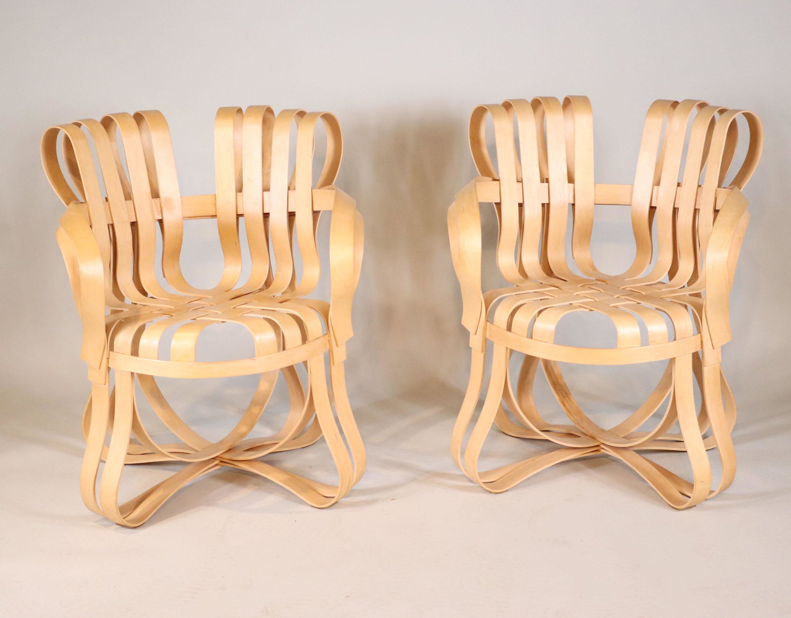 Pair of Frank Gehry Cross Check Armchairs: For Knoll, branded on underside "Made in USA/11-01-93/Gehry/Knoll" 33-1/2"h x 28"w (overall) x 20" seat depth