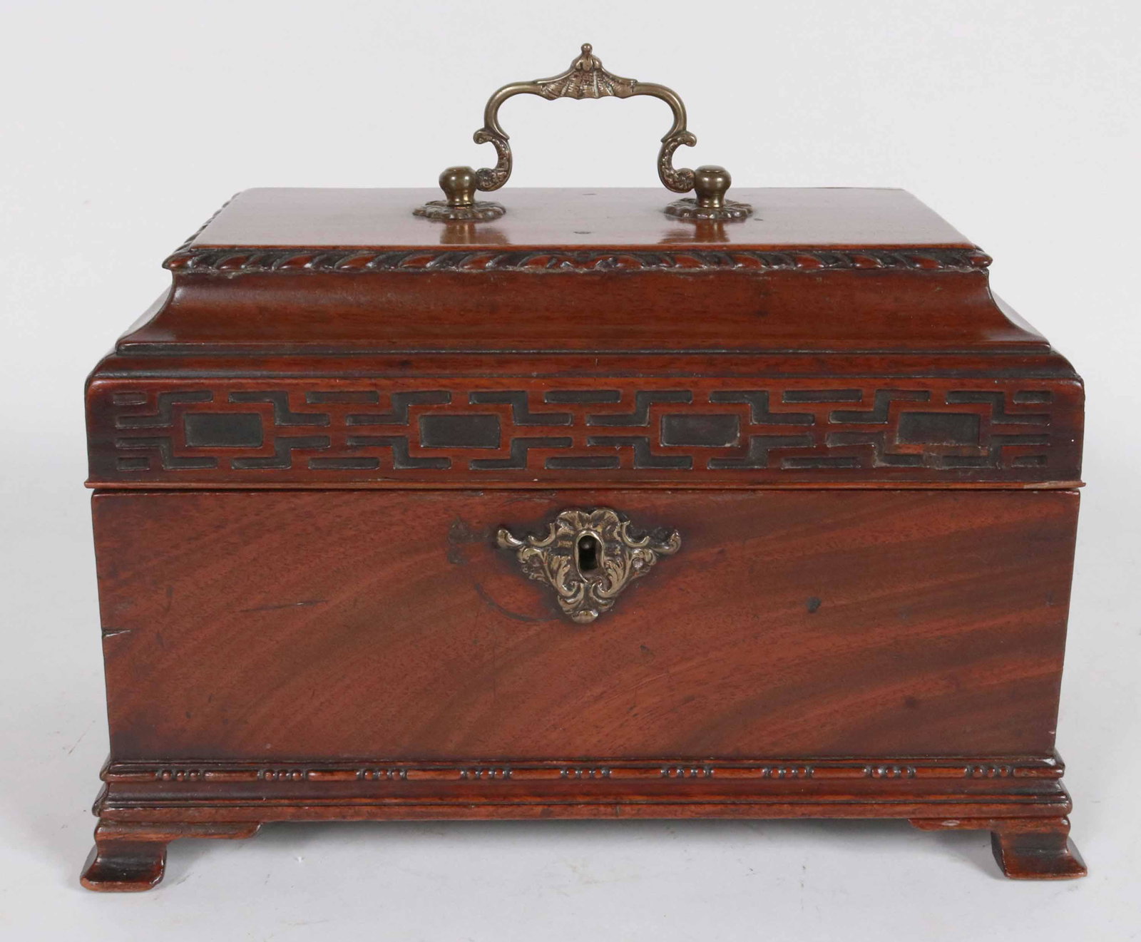 George III Carved Mahogany Sarcophagus Tea Caddy: English, late 18th C. 6-3/4"h x 10-1/2"w x 6-3/4"d Provenance: Property from the Estate of Robert K. Johnson of Maine and South Carolina