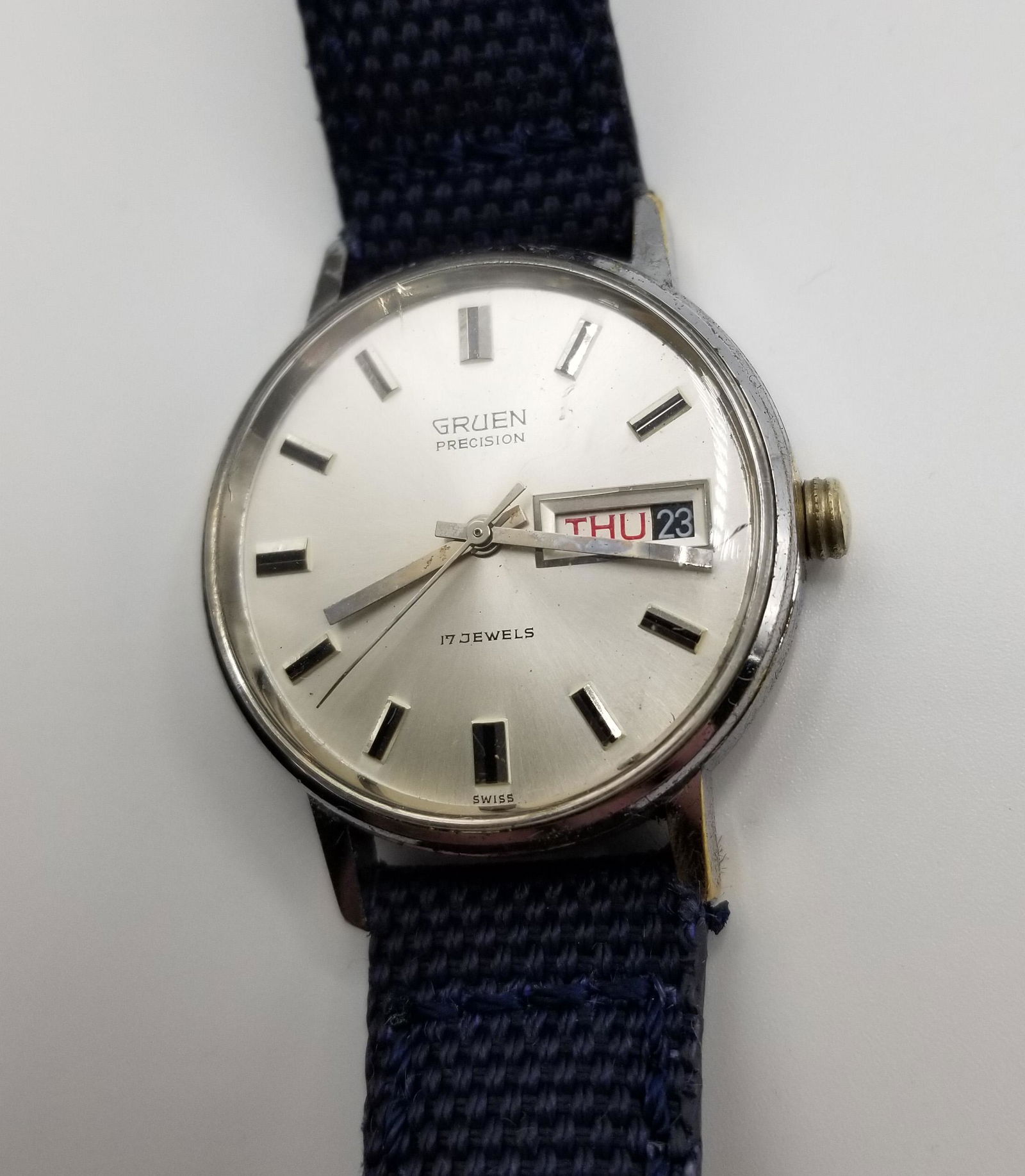 Vintage Gruen Mechanical Day/Date Wrist Watch: Vintage Gruen Mechanical hand-winding Day/Date wristwatch. stainless steel case, unknown crown history, dial in overall good condition. appx. 35mm case size (excluding crown) day/date functions. watch