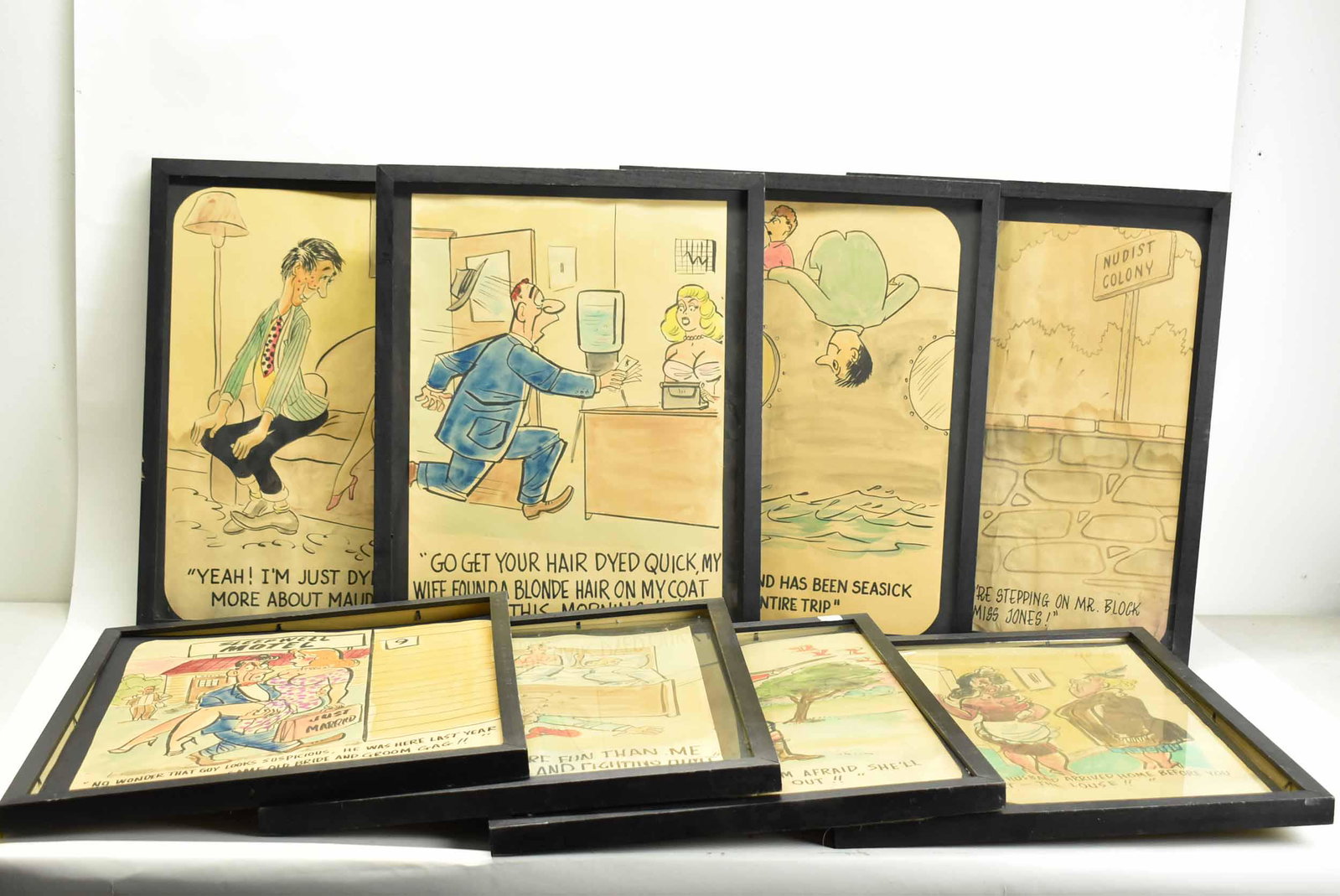 Eight Vintage Satirical Cartoons: Eight Vintage Satirical Cartoons each depicting different humorous scenes, hand colored. Used condition, wear, worn, discoloration, foxing, warping. Frame size 17” x 21 ¼”