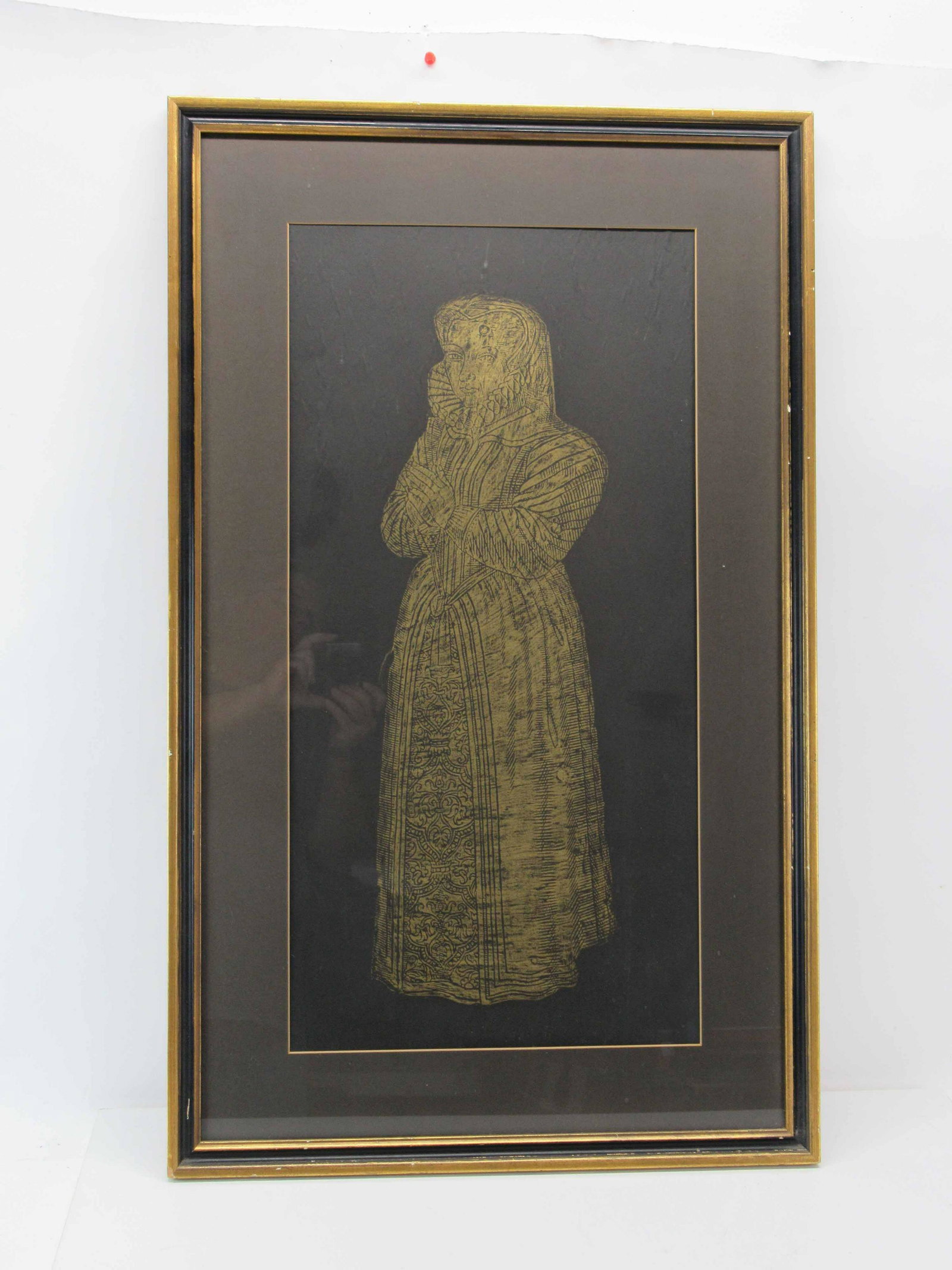 Brass Rubbing of Ellen Metham: Framed Brass Rubbing of 16th C. Ellen Metham, daughter of Mr. Whittington, original brass located in the village of St. Oswald, Lincolnshire, England; used condition, wear/worn, wrinkling to the paper