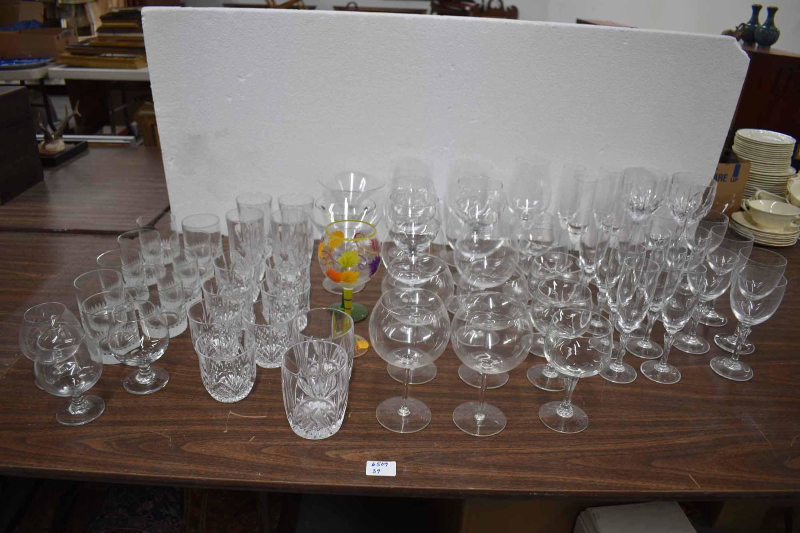 Large Group of Assorted Crystal & Glass Stemware: Large Group of Assorted Crystal & Glass Stemware including 2 Marquis by Waterford water goblets, champagne flutes, wine glasses, brandy snifters and tumblers; used condition, wear/worn