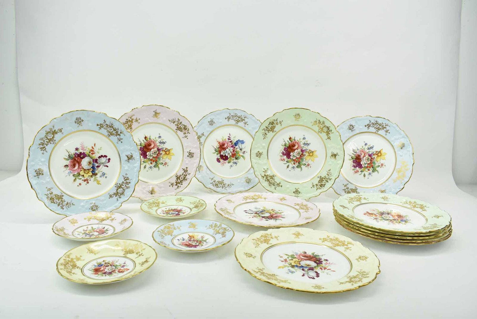 12 Hammersley Porcelain Luncheon Plates: 12 Hammersley Porcelain Luncheon Plates with floral sprays, marked F. Howard; together with four matching saucers; used condition, wear/worn, scratching, a few with chips to foot rims, paint loss, mea