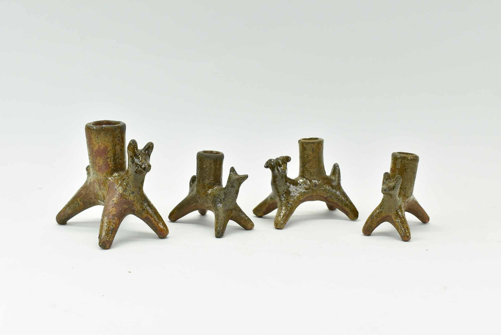 Four Figural Pottery Candle Holders (1 of 5)