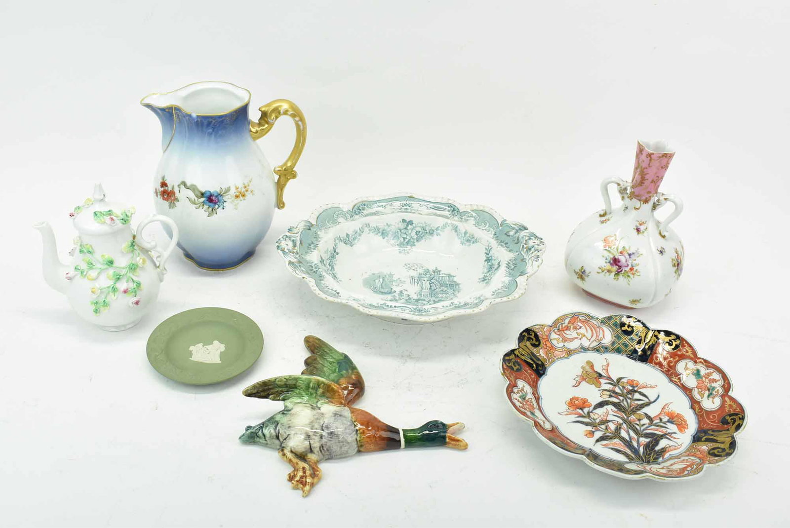 Group of Assorted Porcelain Table Articles: Group of Assorted Porcelain Table Articles including a Royal Dux Mallard Wall Pocket, John Maddock Bombay oval vegetable bowl (hairline), Limoges floral pitcher (hairline and chip on rim), Wedgwood Ja