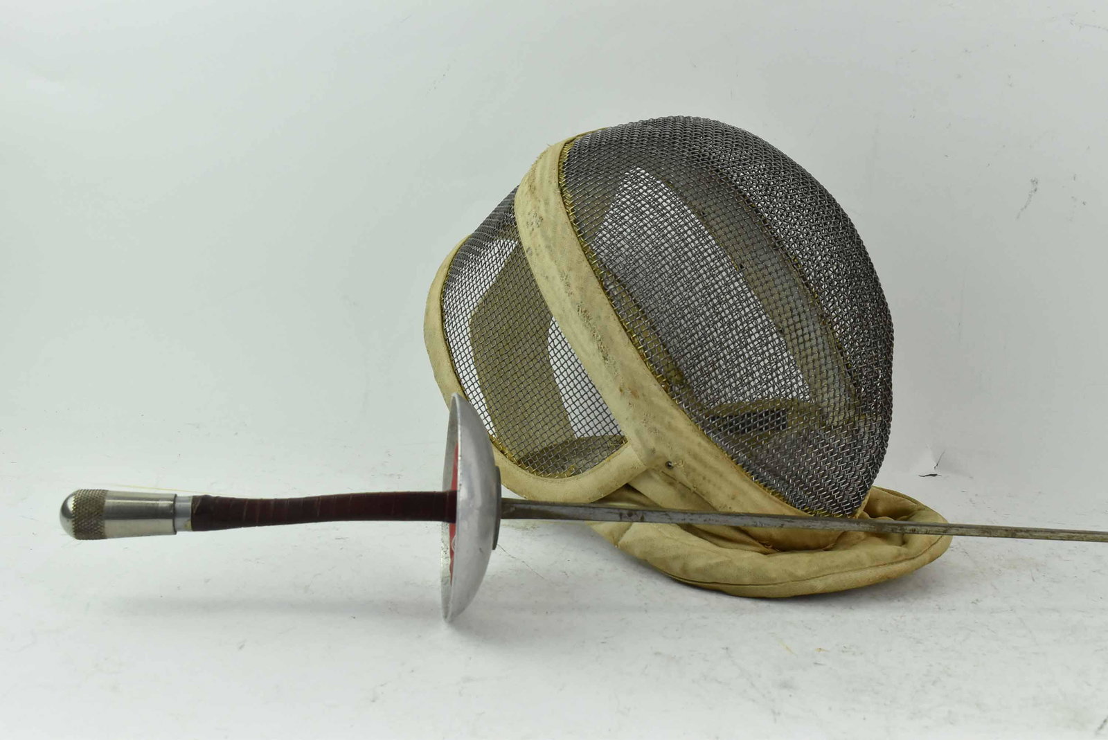 Leon Paul Fencing Foil: Leon Paul Fencing Foil, Paul 5, together with a fencing mask; used condition, wear/worn, soiling, tears to mask, foil measures 42" long