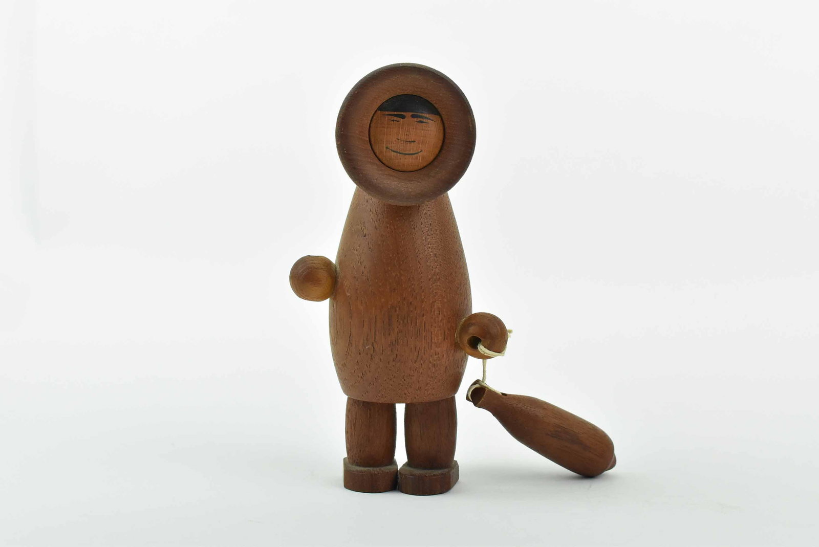 Arne Tjomsland Teak Carved Eskimo Inuit Fisherman: Teak Carved Eskimo Inuit Fisherman attributed to Arne Tjomsland, Mid Century Modern, stamped NORWAY on verso, missing spear; used condition, wear/worn, missing spear, measures 5 7/8" high x 3" wide