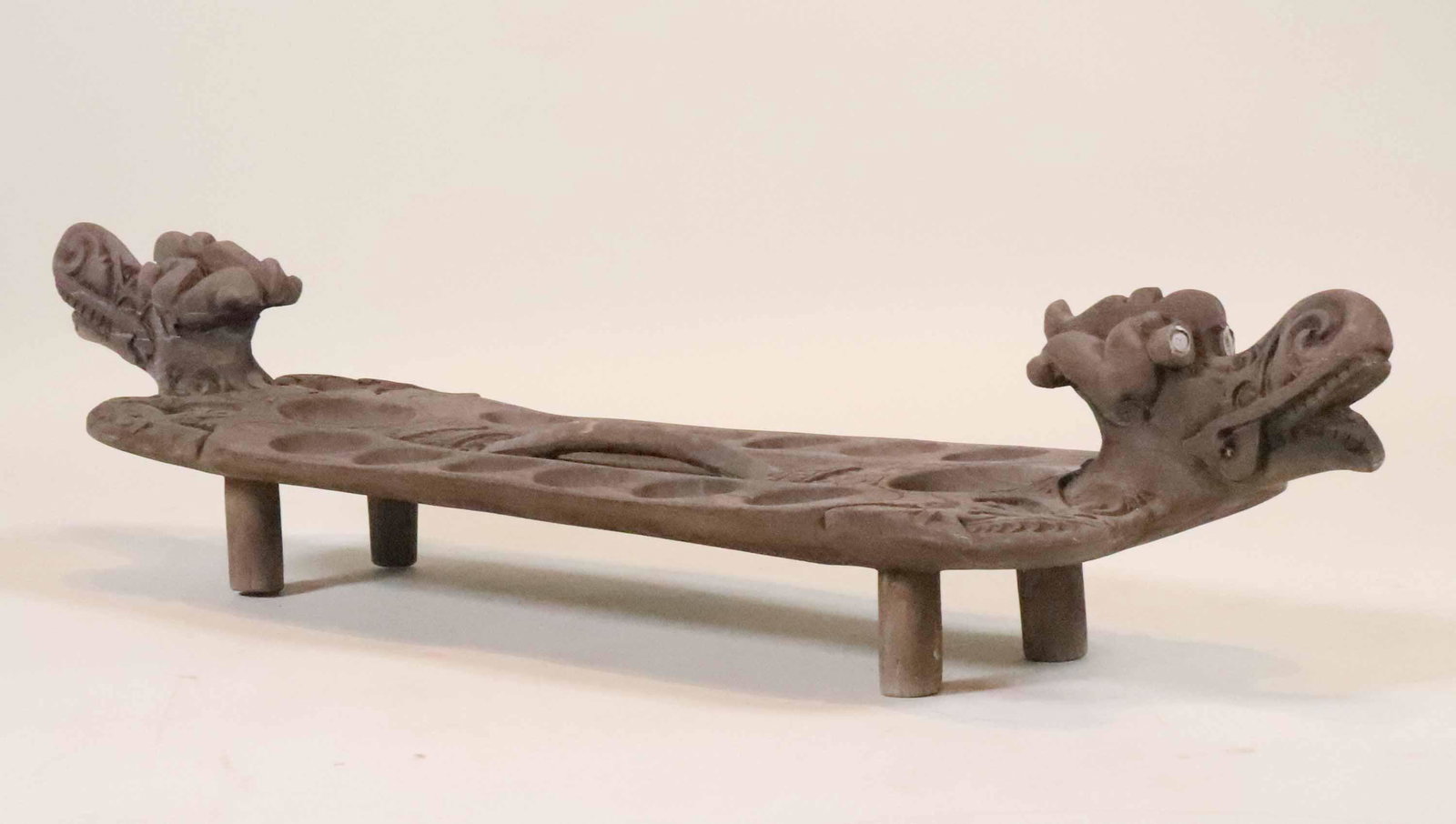 Large Balinese Carved and Footed Game Board: Double dragon finials. 11"h x 51"w x 12"d