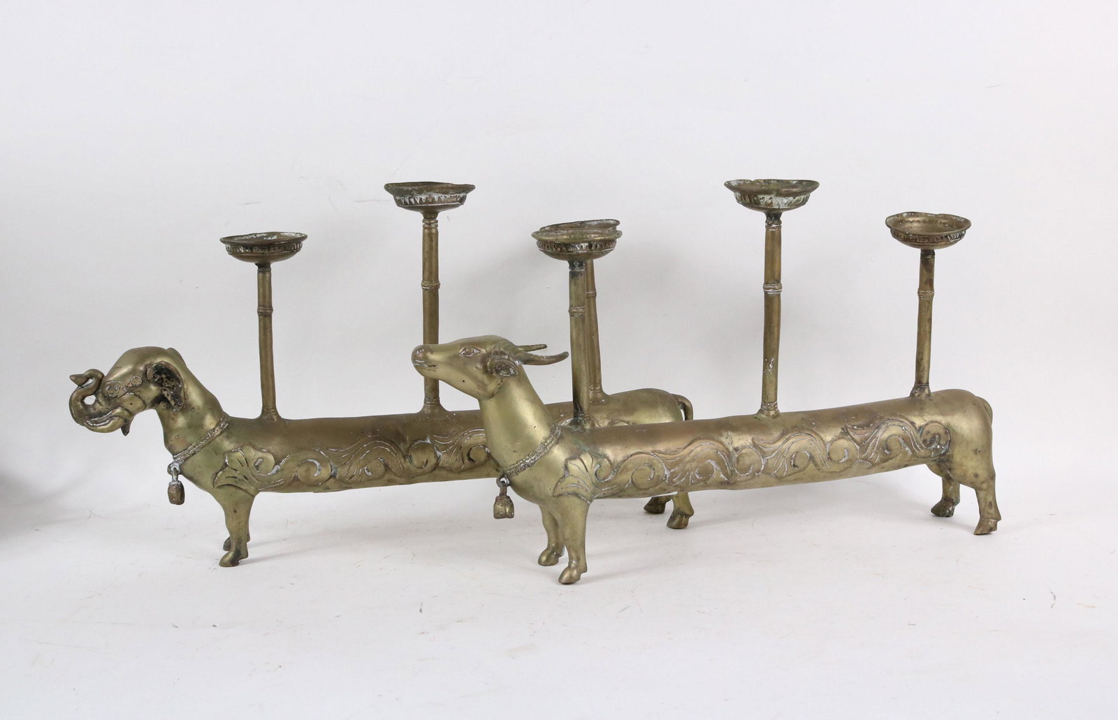 Pair of Balinese Brass Figural Candleholders: One an ox and an elephant. Some wear and dents. 12-1/4"h x 20"l