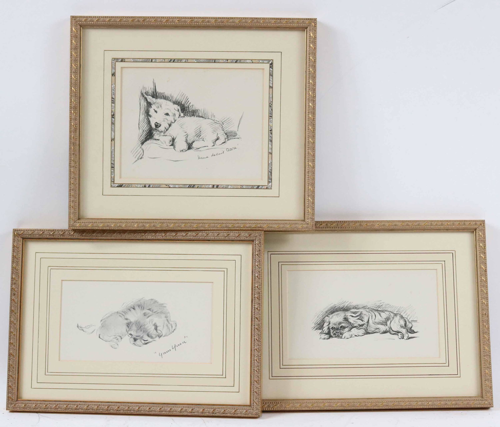 Three Lucy Dawson Prints of Sleepy Puppies: 20th C. on inscribed "Yum Yum" and one "Deena Doesn't Care." From: 8-1/2"h x 11-3/4"w to 9-3/4"h x 11-1/4"w Overall Provenance: Property from a Private Rumson, NJ Collection