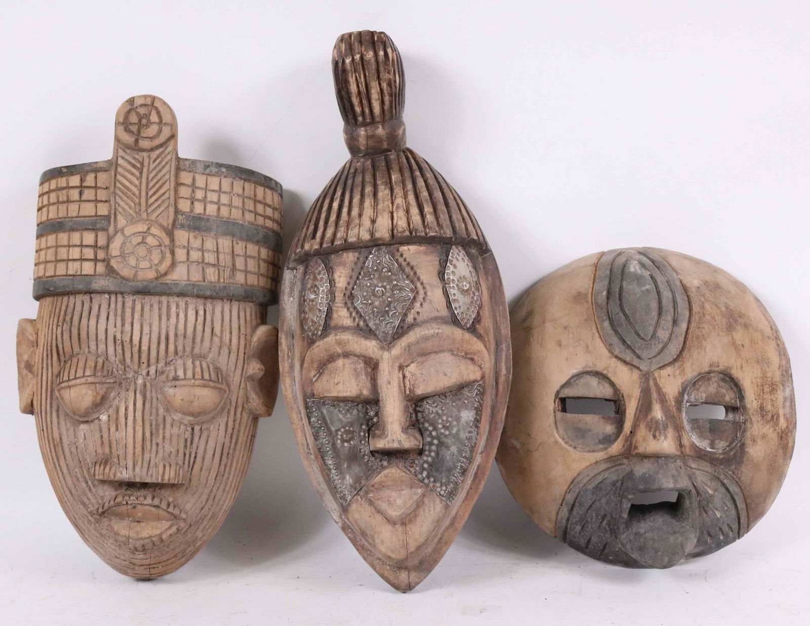 Three Carved Wood African Masks (1 of 5)