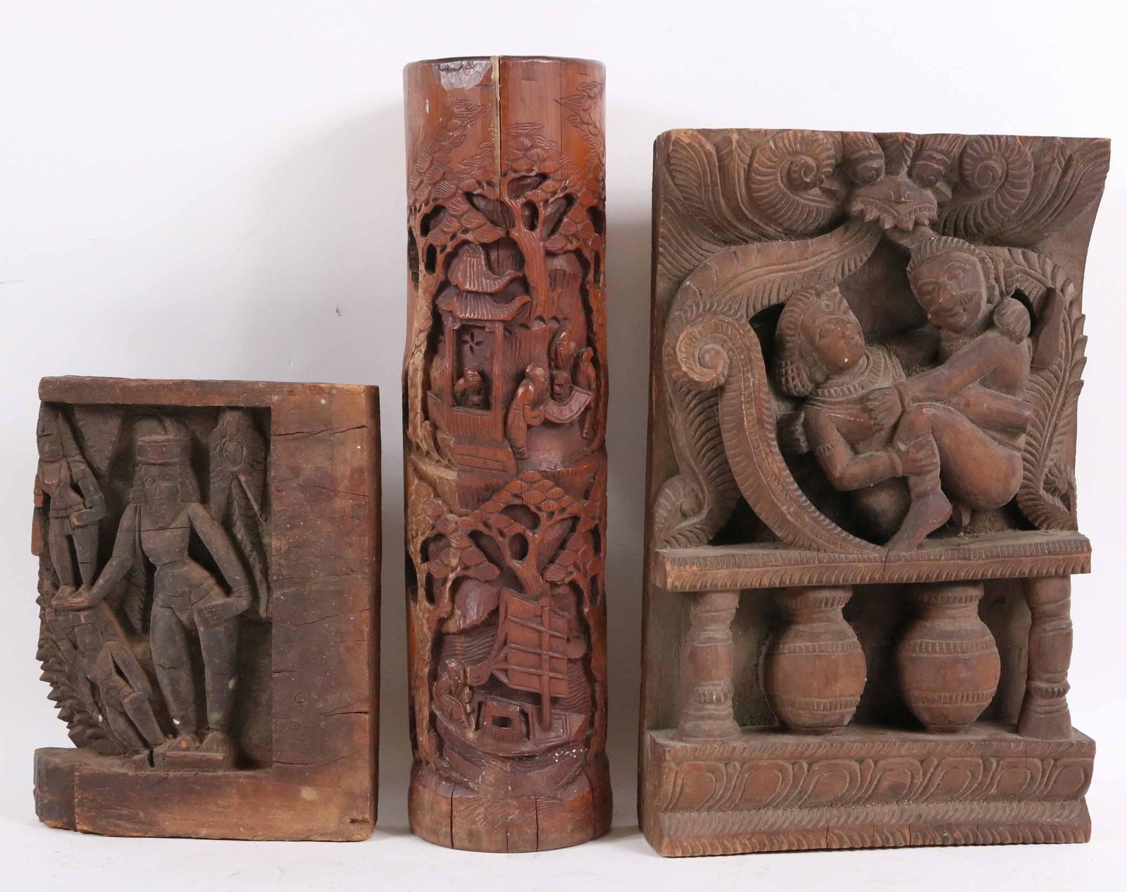 Two Asian Carved Wood Fragments: Possibly Nepalese, depicting figures. Together with a Chinese carved bamboo vase. 3 pieces 9-1/2"h, 14-1/2"h, and 15-3/4"h