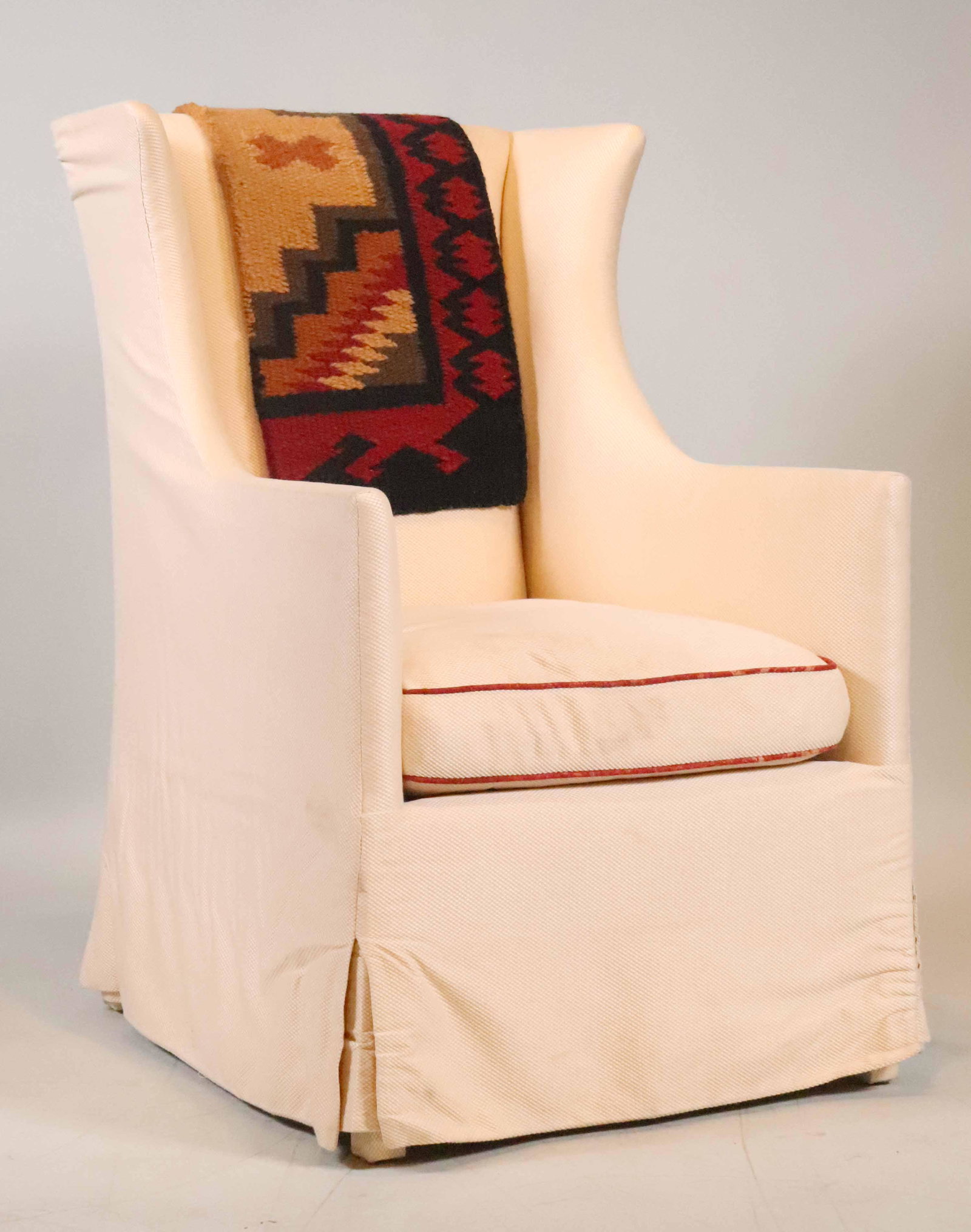 Beige Upholstered Wingback Armchair: 20th C. Wear, distress. 42-1/2"h x 26"w