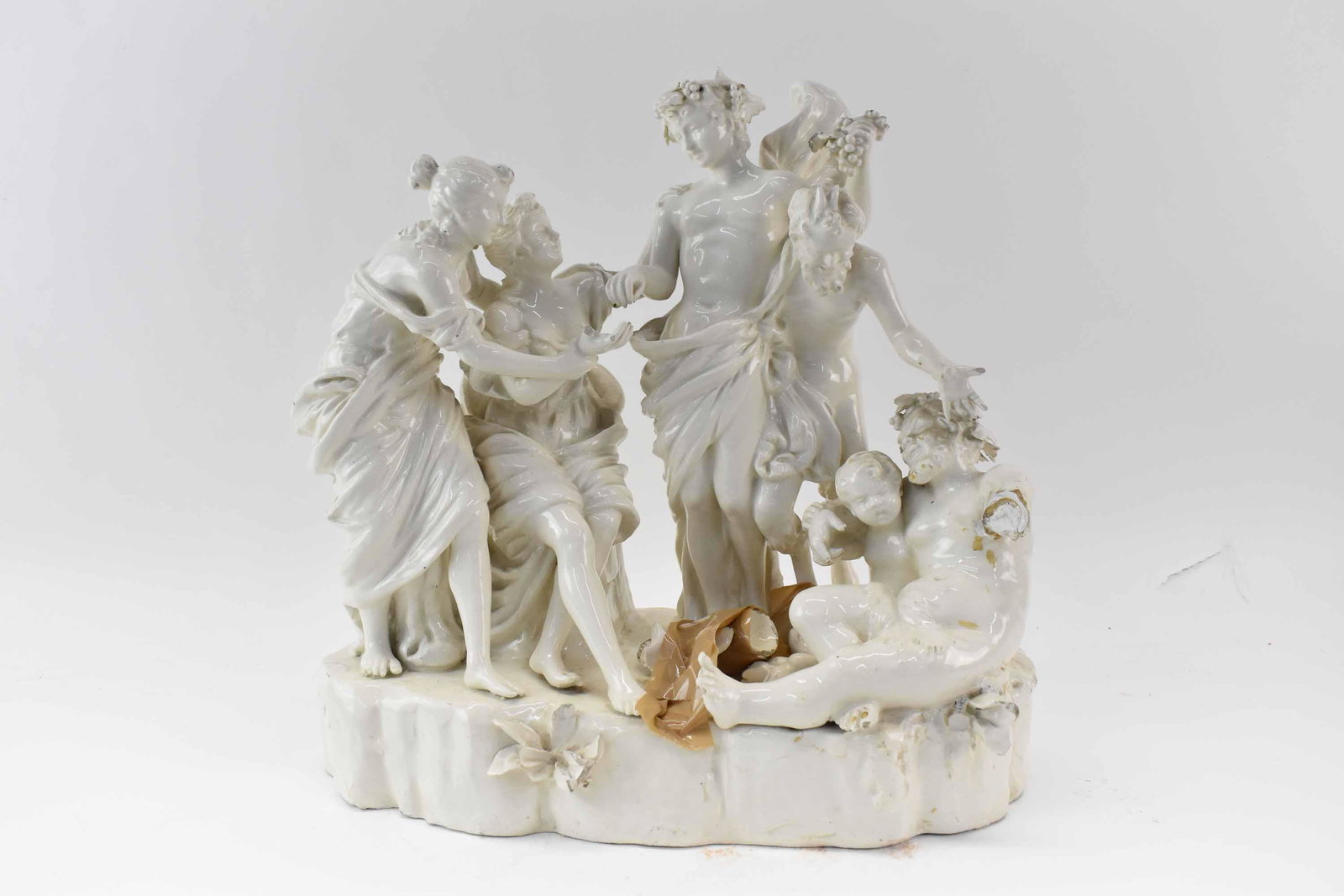 Capodimonte Blanc de Chine Porcelain Group: Capodimonte Capo-di-Monte Blanc de Chine Porcelain Group with Satyrs; used condition, wear/worn, repairs, breaks, losses, chips, missing pieces, measures 15" long x 8" deep x 14 1/2" high