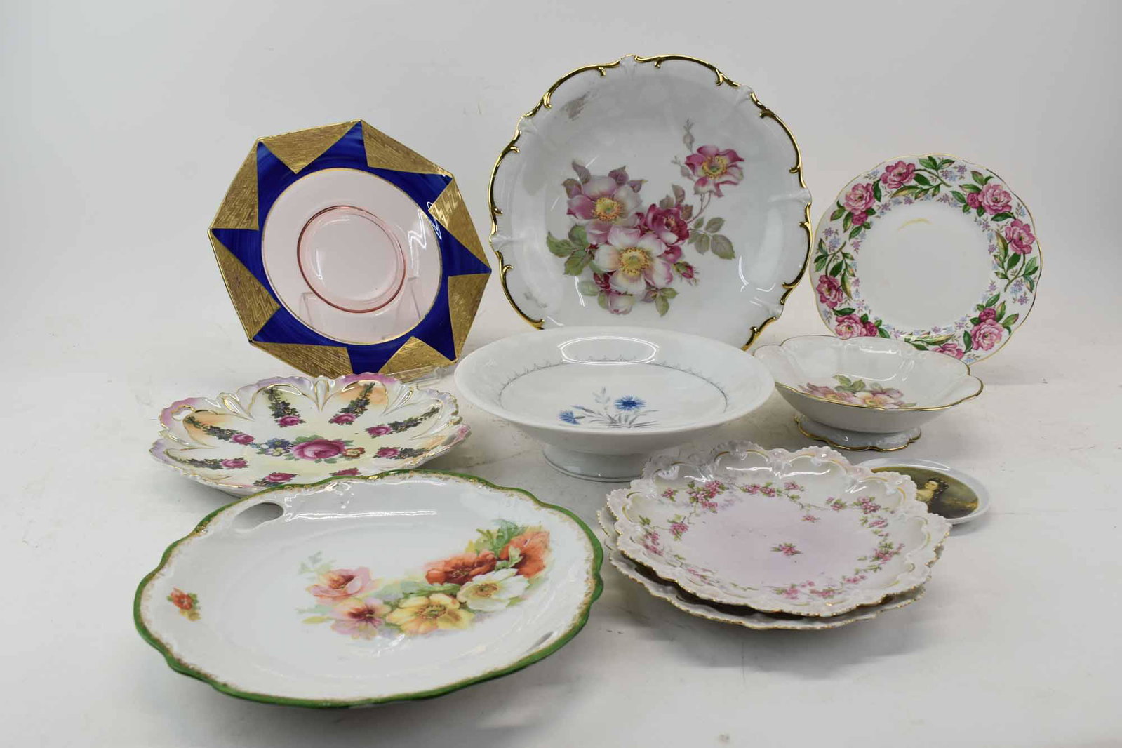 Group of Porcelain Plates and Serving Dishes: Group of Porcelain Plates and Serving Dishes, including, B&G, German, Roselyn, Bavarian, Austrian, and a glass plate. 10 pieces Chips, wear.