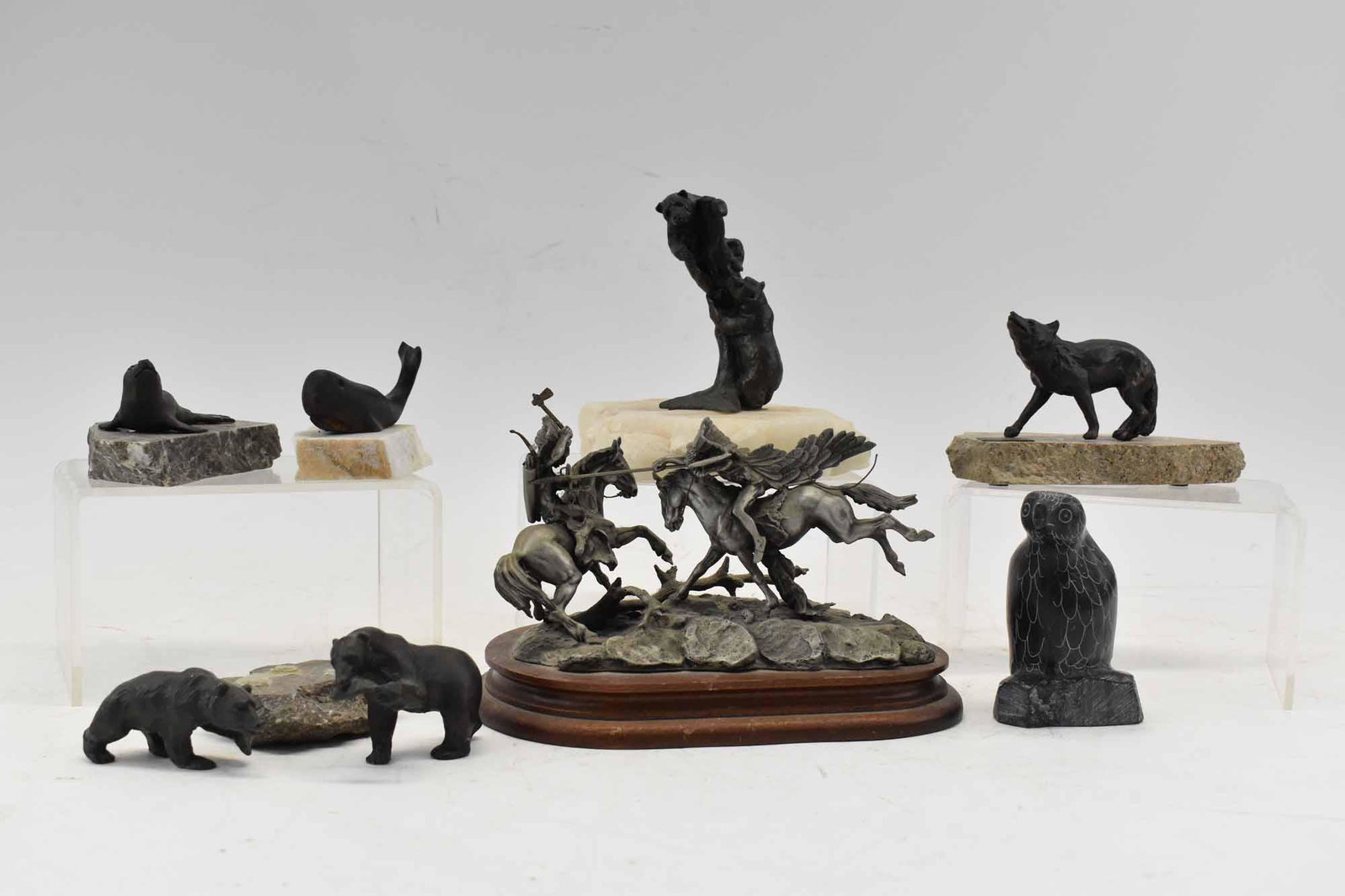 5 Siggy Puchta Bronze Sculptures: 5 Siggy Puchta Bronze Sculptures including a limited edition Fox mounted on base #55, Bear Cubs Climbing Tree mounted to base, Grizzly Bear (unglued from base), Seal mounted on base, and a Bear eating
