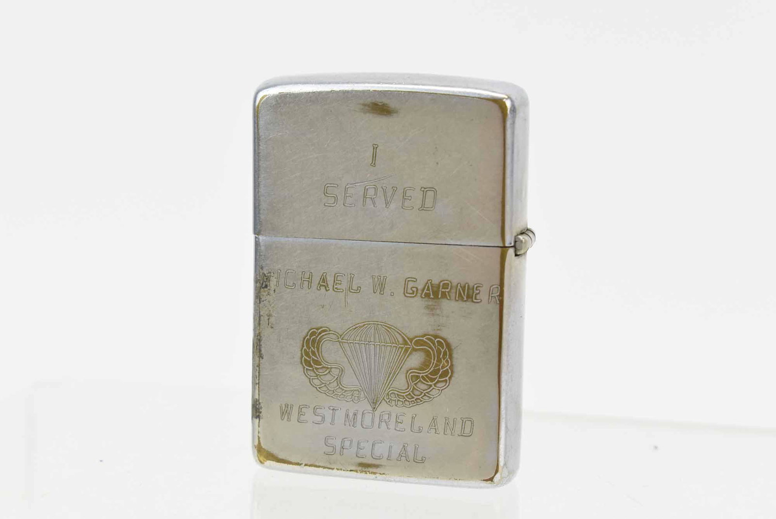 Vintage Vietnam Zippo Lighter Airborne: Vintage Vietnam Zippo Lighter Airborne Reads Viet Nam 67-68 Company F Long Range Patrol 51st Inf. Airborne. On verso reads I Served Michael W Garner Westmorland Special. Used unknown working condition