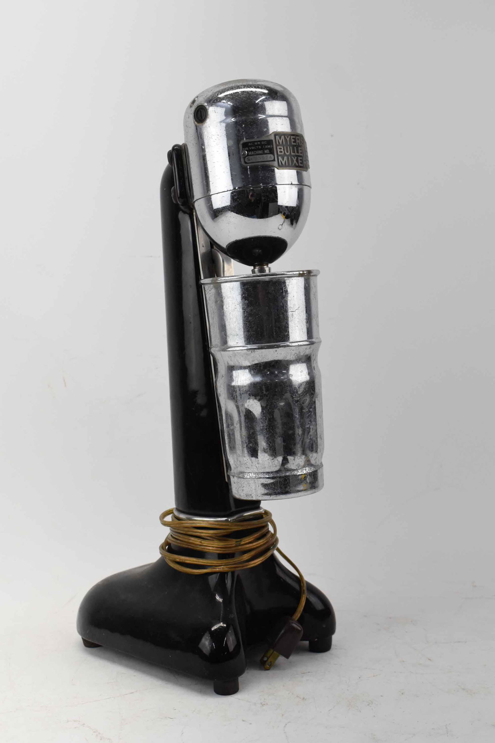 Vintage Myer's Bullet Mixer: Vintage Myer's Bullet Mixer, malt and milkshake, single having black enameled base; used condition, wear/worn, unknown working condition, oxidation, scratching, measures 18 1/2" high x 8" deep x 6" de