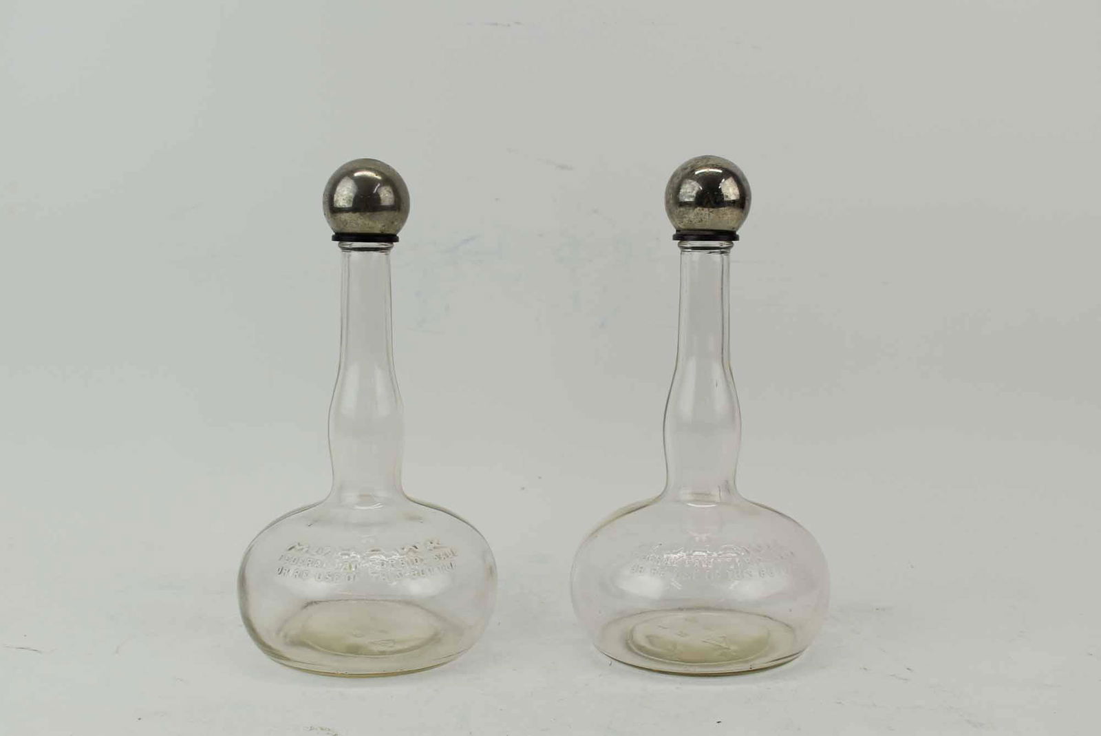 Pair of Mohawk Whiskey Decanter Bottles (1 of 11)