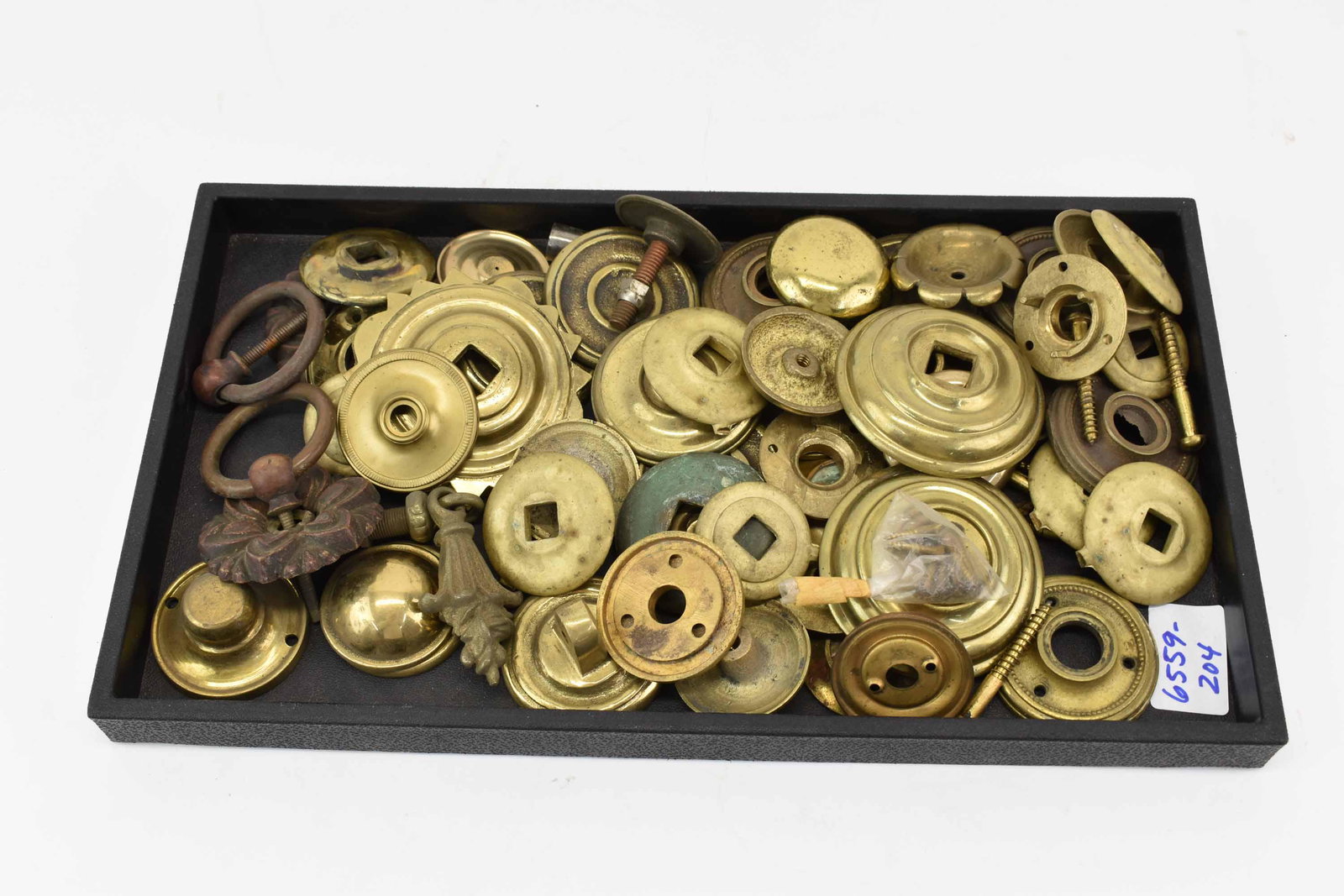Group of Brass Drawer Back Plates: Group of Brass Drawer Back Plates of various shapes and sizes; used condition, wear/worn