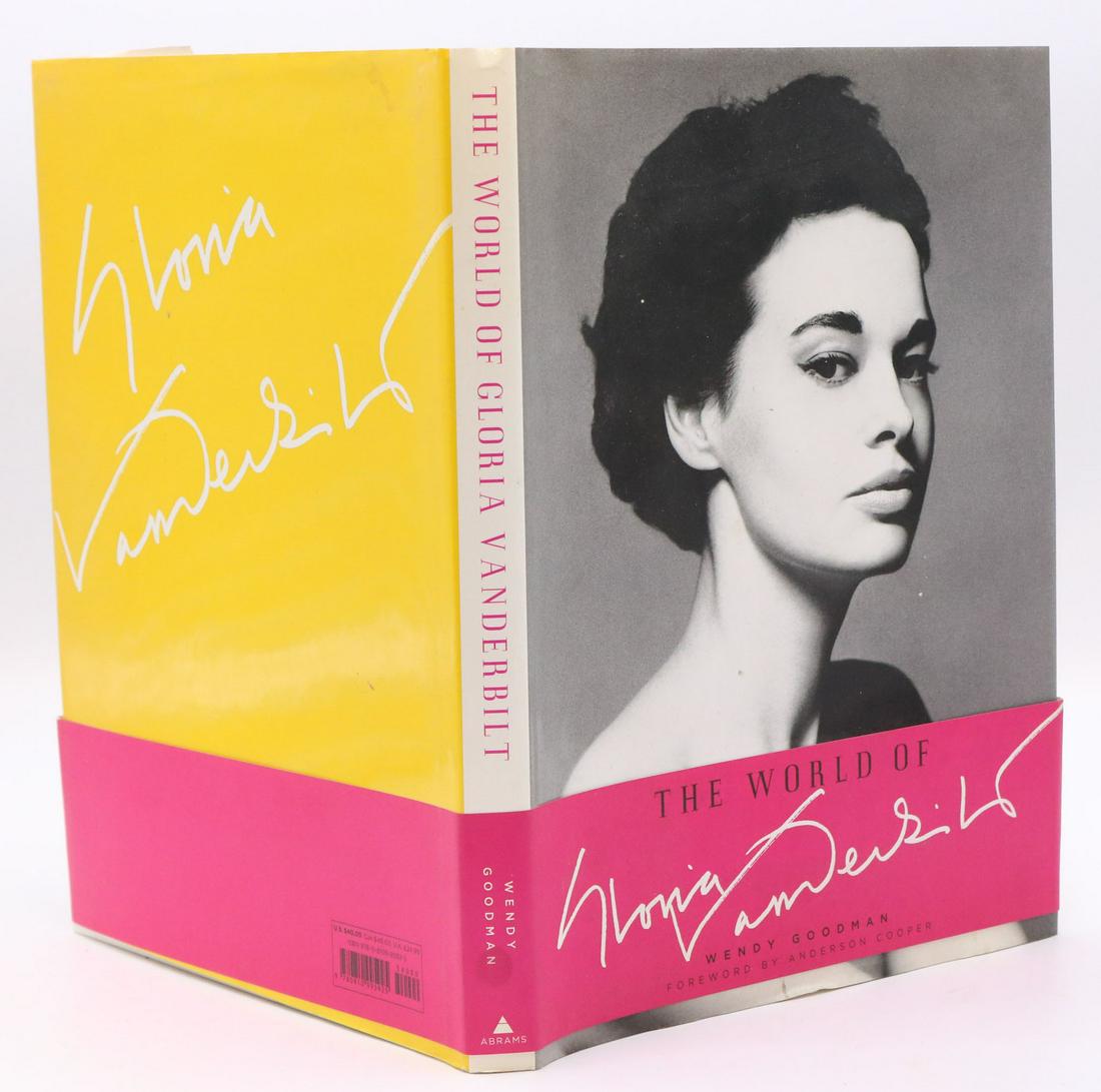 The World of Gloria Vanderbilt by Wendy Goodman: Inscribed and signed by Gloria Vanderbilt in 2010. All books sold "as is." No guarantees made about number of books in lot or condition of books. No returns or refunds. Please contact Nye & Company fo