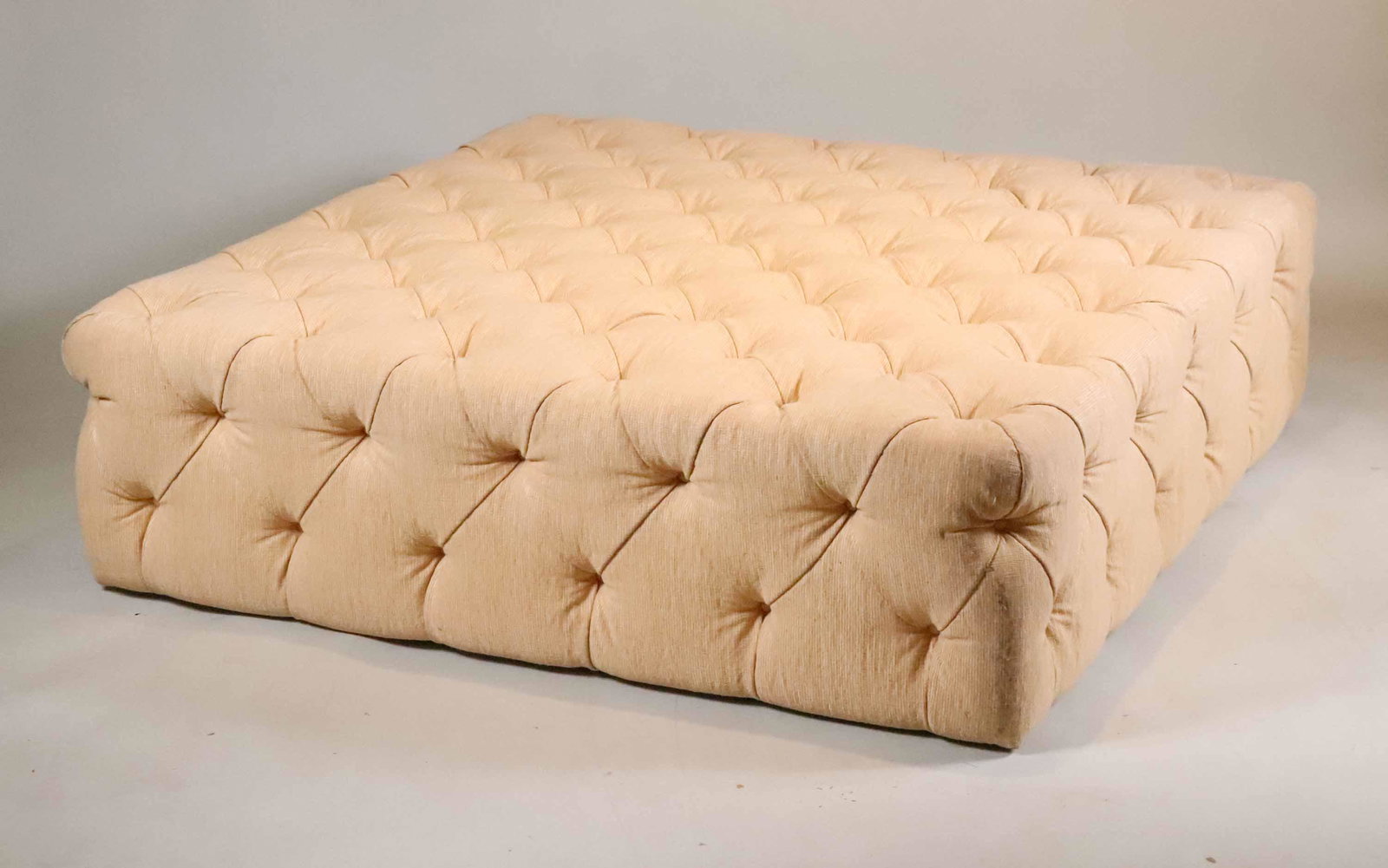 Cream Tufted Upholstered Ottoman (1 of 5)