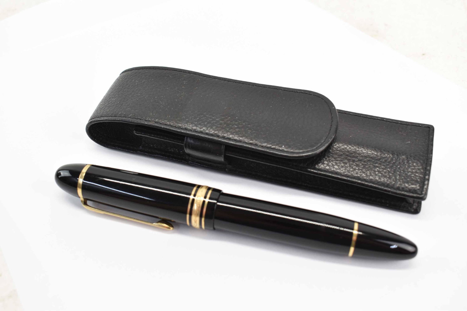 Montblanc Meisterstuck 149 Fountain Pen, 585 Nib: Montblanc Meisterstuck 149 Fountain Pen, 585 14C Nib together with soft leather pouch Unused condition; minor wear Measures approximately 5 3/4" long