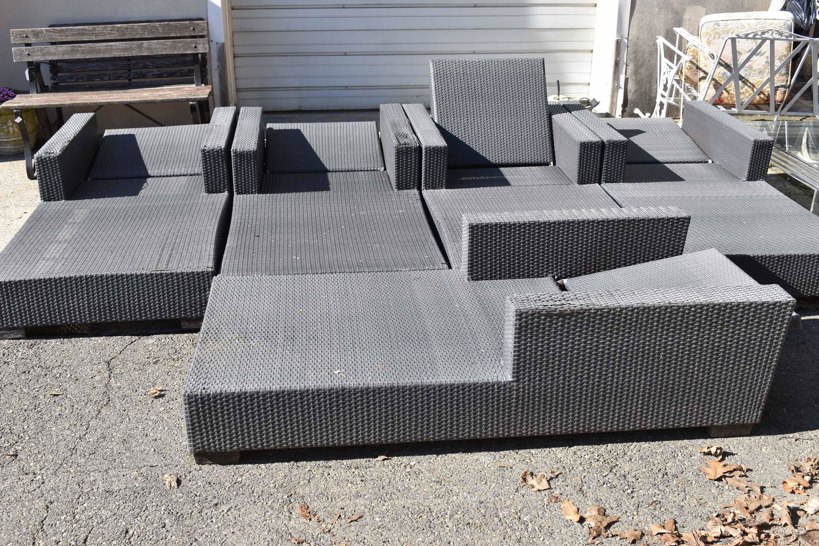 Set of 5 All-Weather Wicker Chaise Lounges: Set of 5 All-Weather Wicker Chaise Lounges together with 2 matching ottomans Used condition, wear/worn, surface distress, fading, damage. Chaises measure approximately 70" long x 35" wide x 19" tall