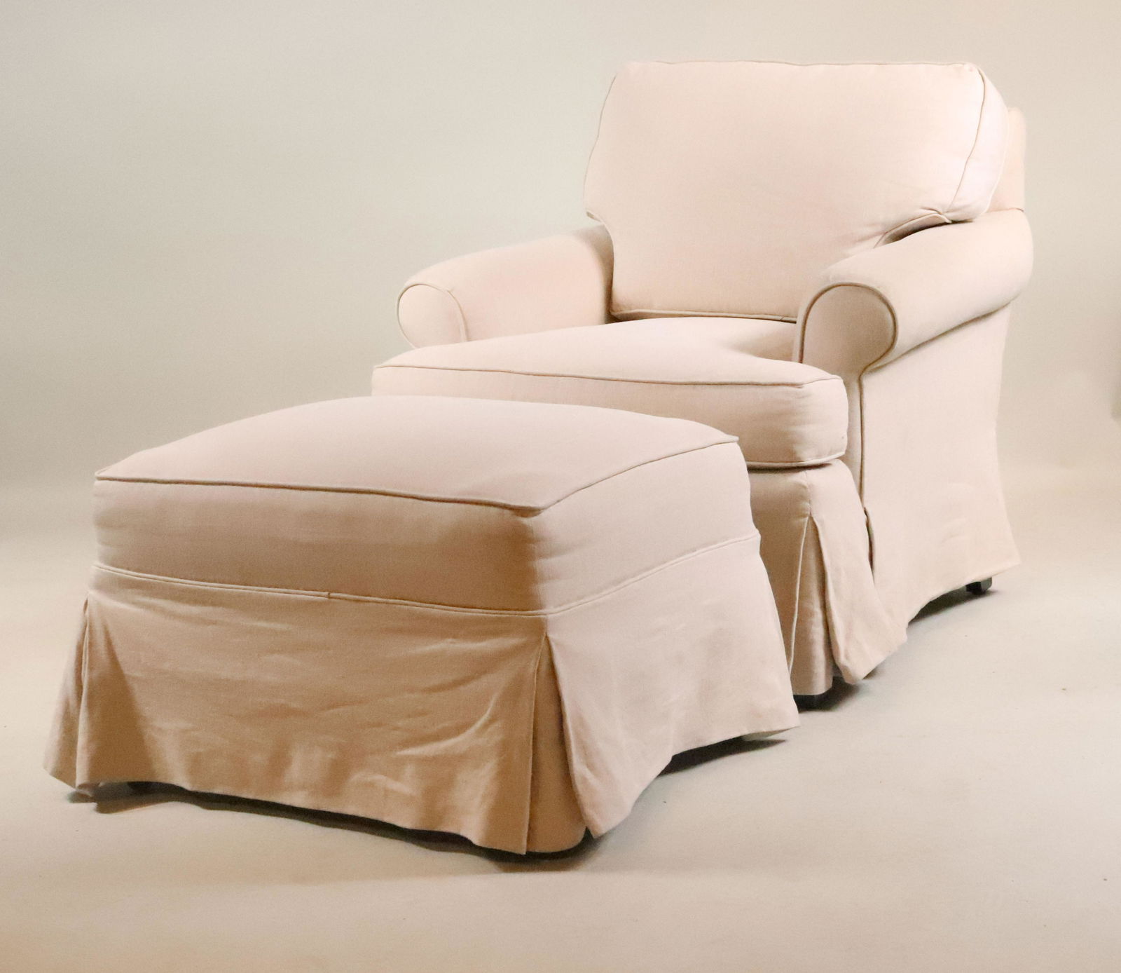 Modern Cream-Upholstered Club Chair and Ottoman (1 of 6)
