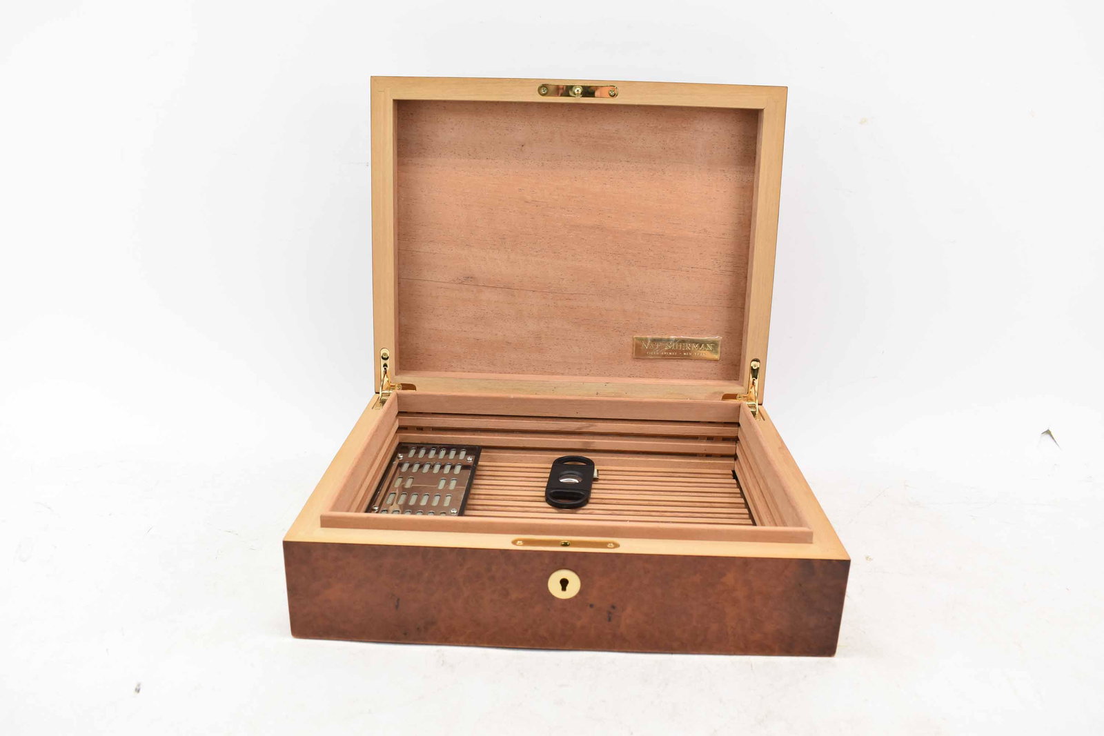 Nat Sherman Burl Wood Humidor: Nat Sherman Burl Wood Humidor with cigar cutter, plate on interior reads Nat Sherman Fifth Avenue New York; used condition, wear/worn, scratching, missing key, measures 13 3/8" long x 10 3/4" wide x 4