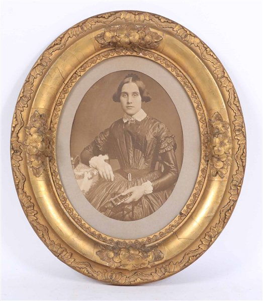 Vintage Sepia Toned Photograph of a Woman (1 of 3)