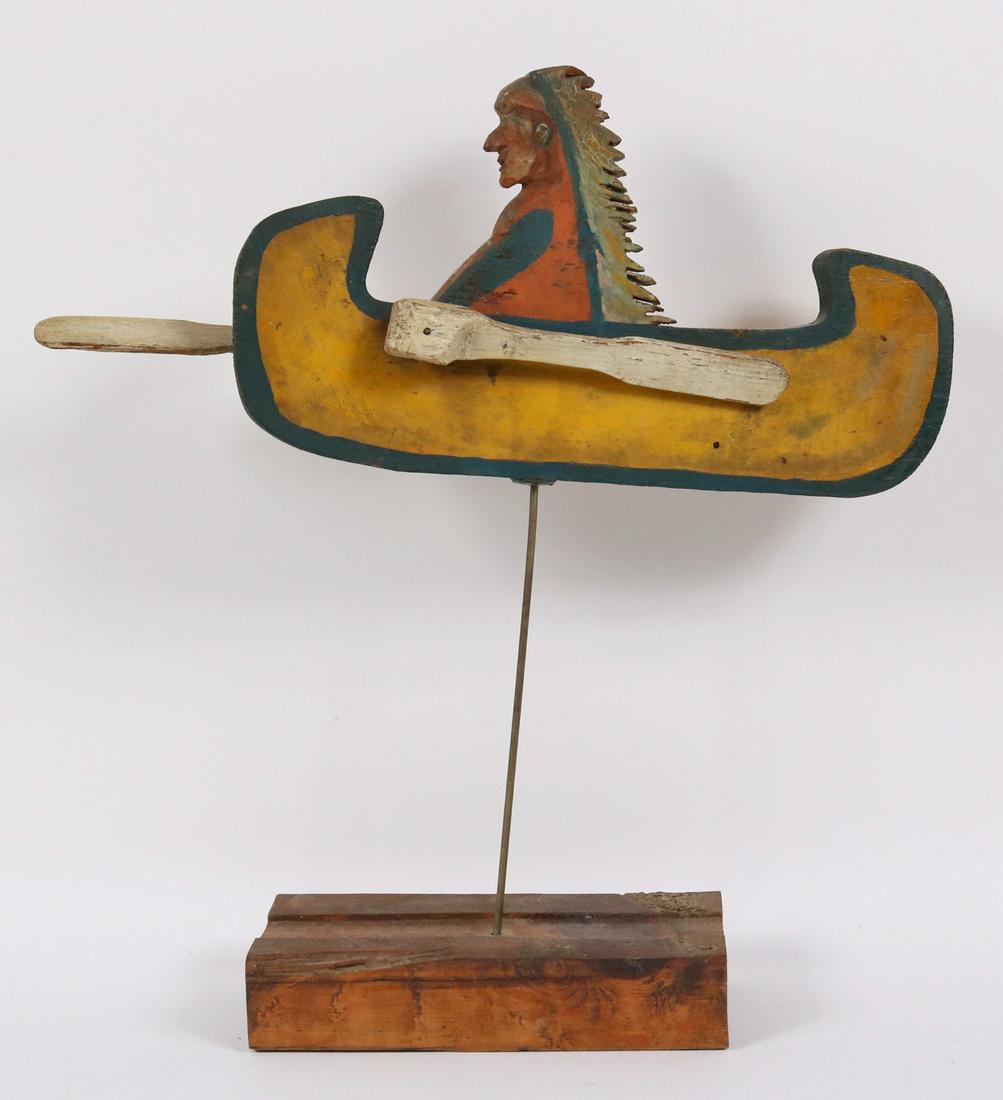 Carved and Painted Indian Whirligig: American, 20th C., on later stand Overall: 15"h x 13-1/2"l Provenance: Property from the collection of William and Linda Weimer, Ohio and Florida