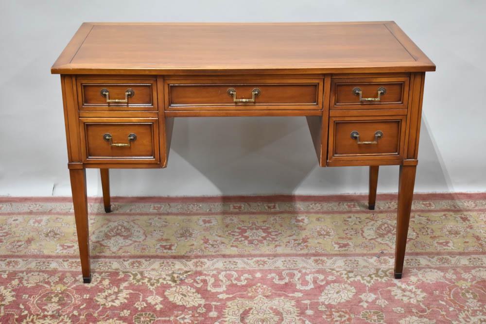 Provincial Style Fruitwood Writing Desk: Provincial Style Fruitwood Writing Desk having central drawer flanked by two stacked drawers and one single drawer on the right. Used condition, wear, worn, chips. 30" tall x 45" long x 23" deep