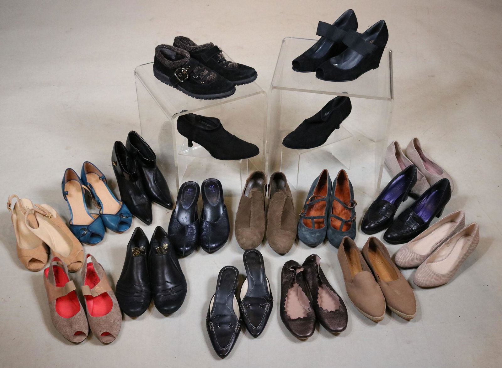 Seventeen Pairs of Ladies Casual Shoes: Including, Rockport, Stuart Weitzman, Tods, Coclico, and Sketchers. Mostly size 8 or 8.5. Wear, used condition. Property from a Short Hills, NJ and San Francisco, CA Private Collection