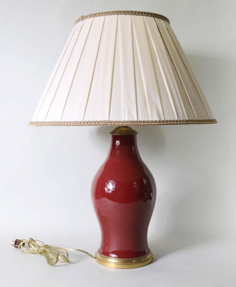 Chinese Sang de Boeuf Glazed Porcelain Vase: 19th/20th C., now fitted as a lamp Overall: 27"h Provenance: Property from the NAMITS collection