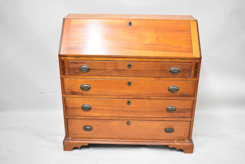 Antique Slant From Writing Desk: Antique Slant From Writing Desk having four graduated drawersCondition: Used, wear, wornSize: 39 1/2"h x 41"w x 18"d