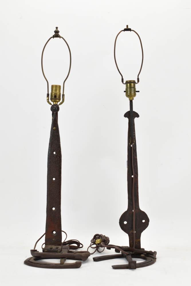 Pair of Vintage Iron Horseshoe Handmade Lamp: Pair of Vintage Iron Horseshoe Handmade Lamp having straphindge body and horseshoe base. Used condition, wear, worn, unknown working condition. Overall height to top of harp 29 1/2"