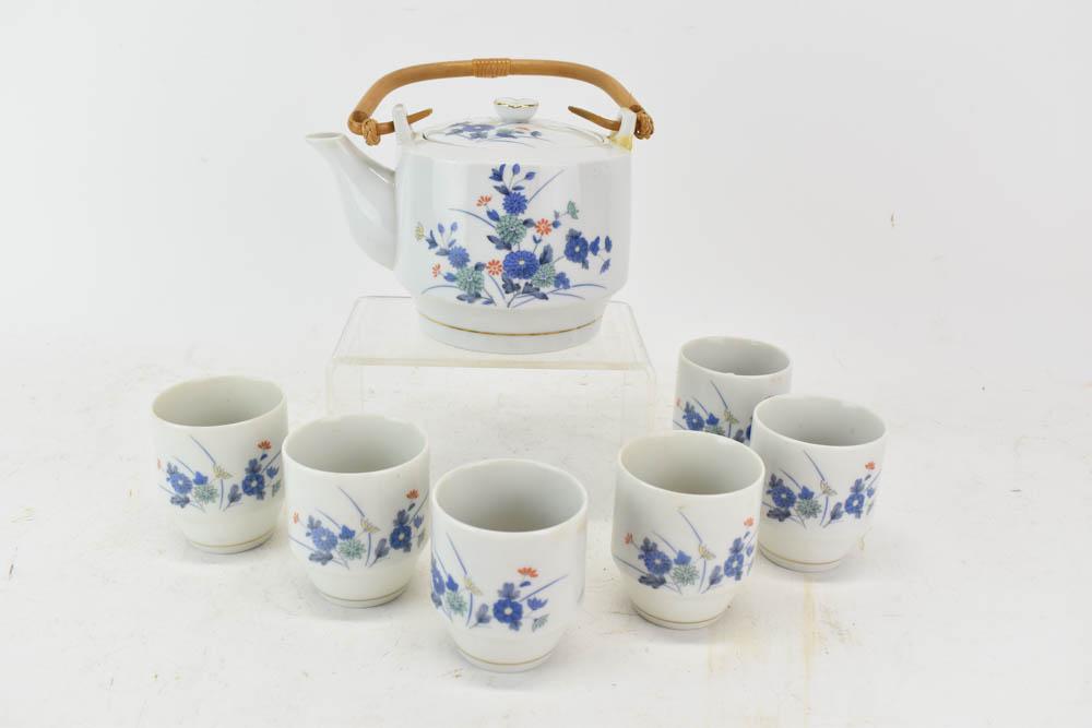 Japanese Porcelain Tea Service: Japanese Porcelain Tea Service, 20th C., 6 cups and a teapot Repairs Teapot: 4-3/4"h Cup: 3"h