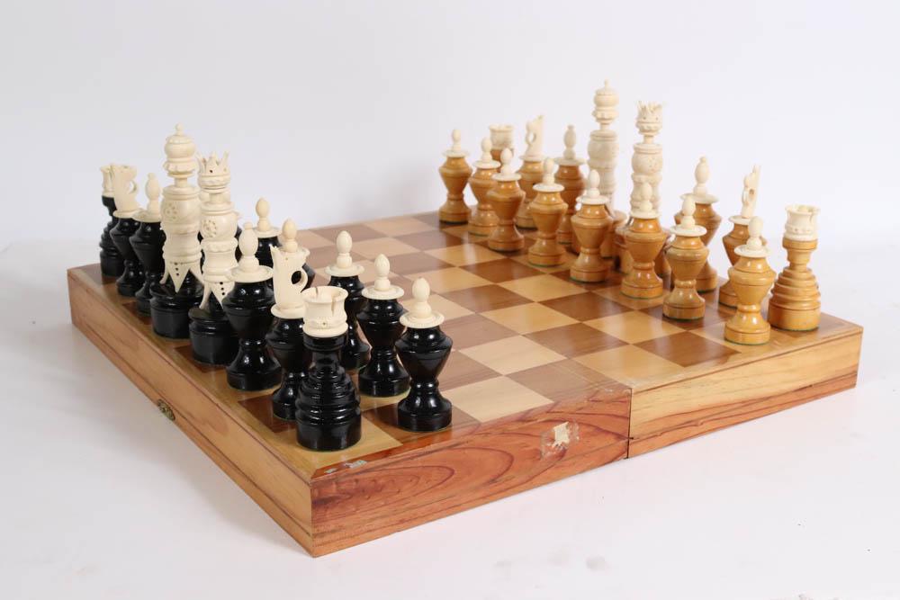 Antique Hand Carved Chess Set with Bone: Antique Hand Carved Chess Set with Bone finishing and Board in overall good condition. King size approx. 6". All pieces in good condition. Minor wear and scratches to wood. Includes all pieces with a 